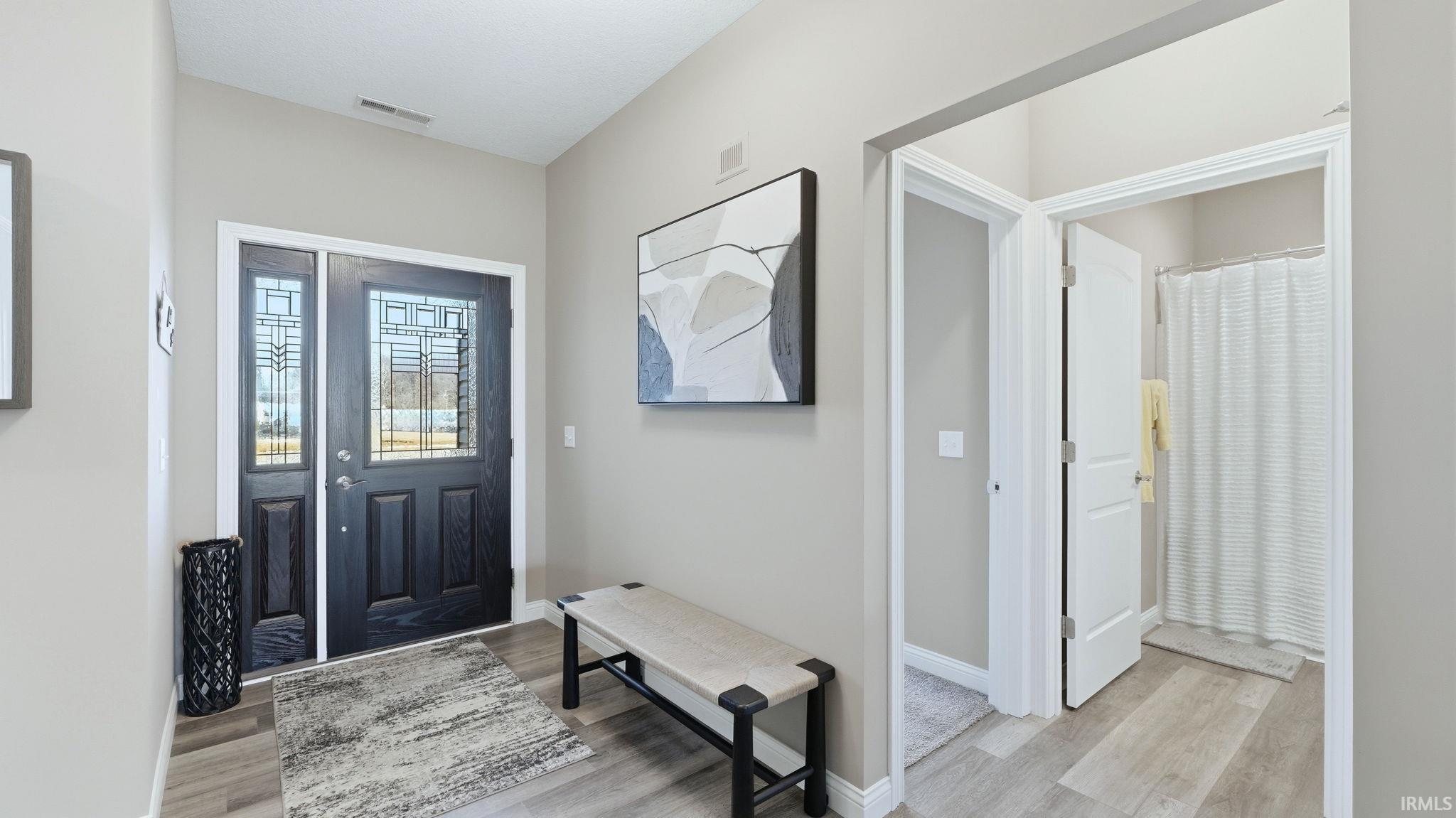 Entryway featuring light wood-style flooring