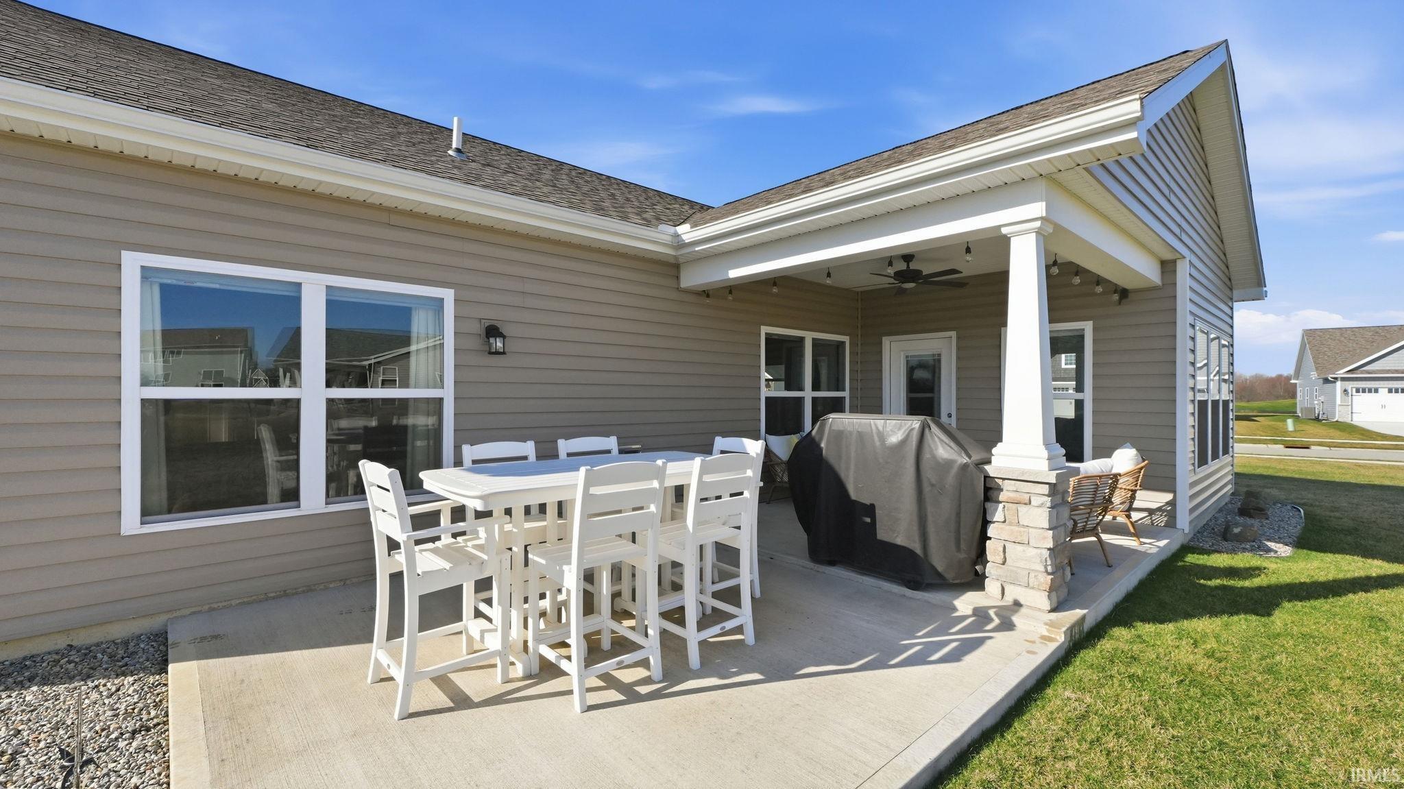 View of patio / terrace featuring ceiling fan, grilling area, and outdoor dining space