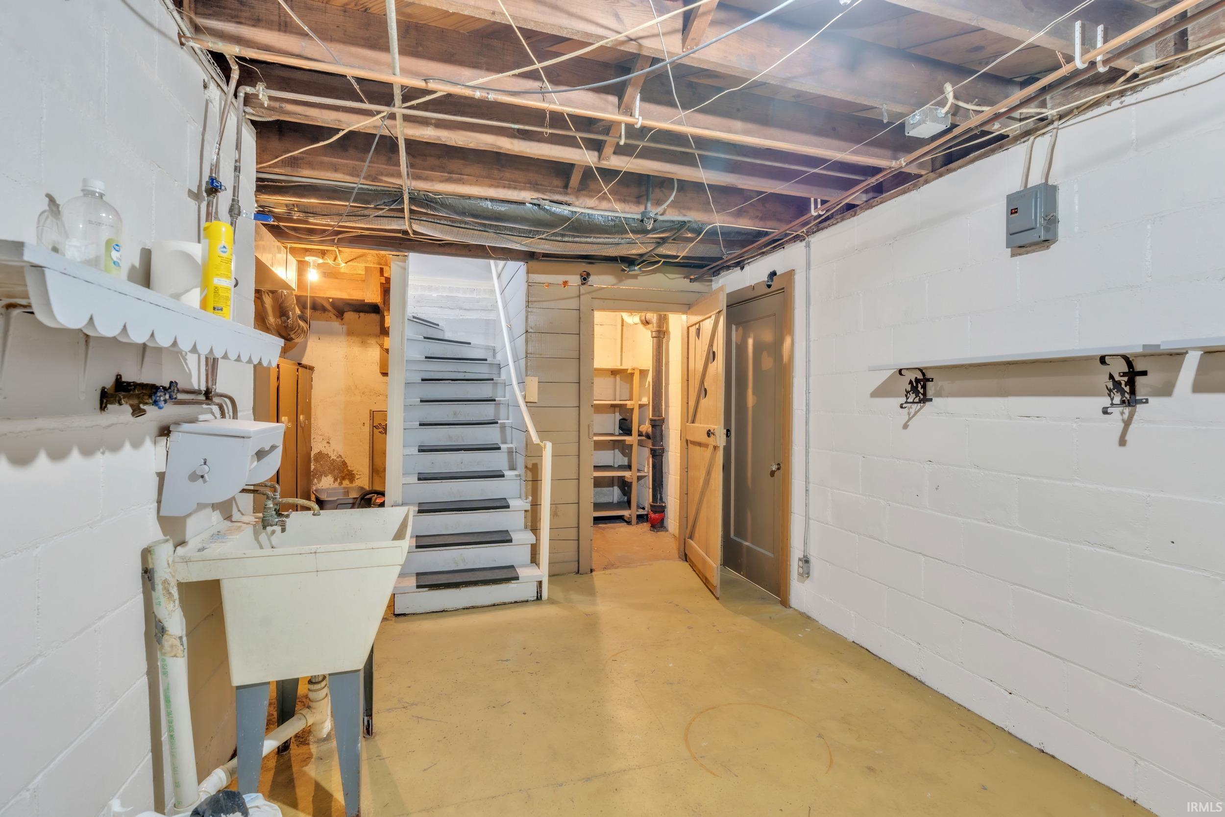 Unfinished below grade area with stairway