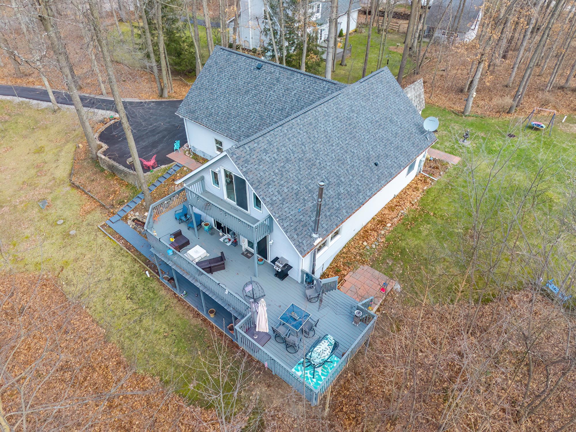 Drone / aerial view of a tree filled landscape