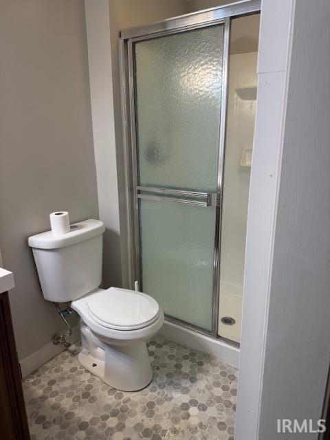 Bathroom with wallpapered walls