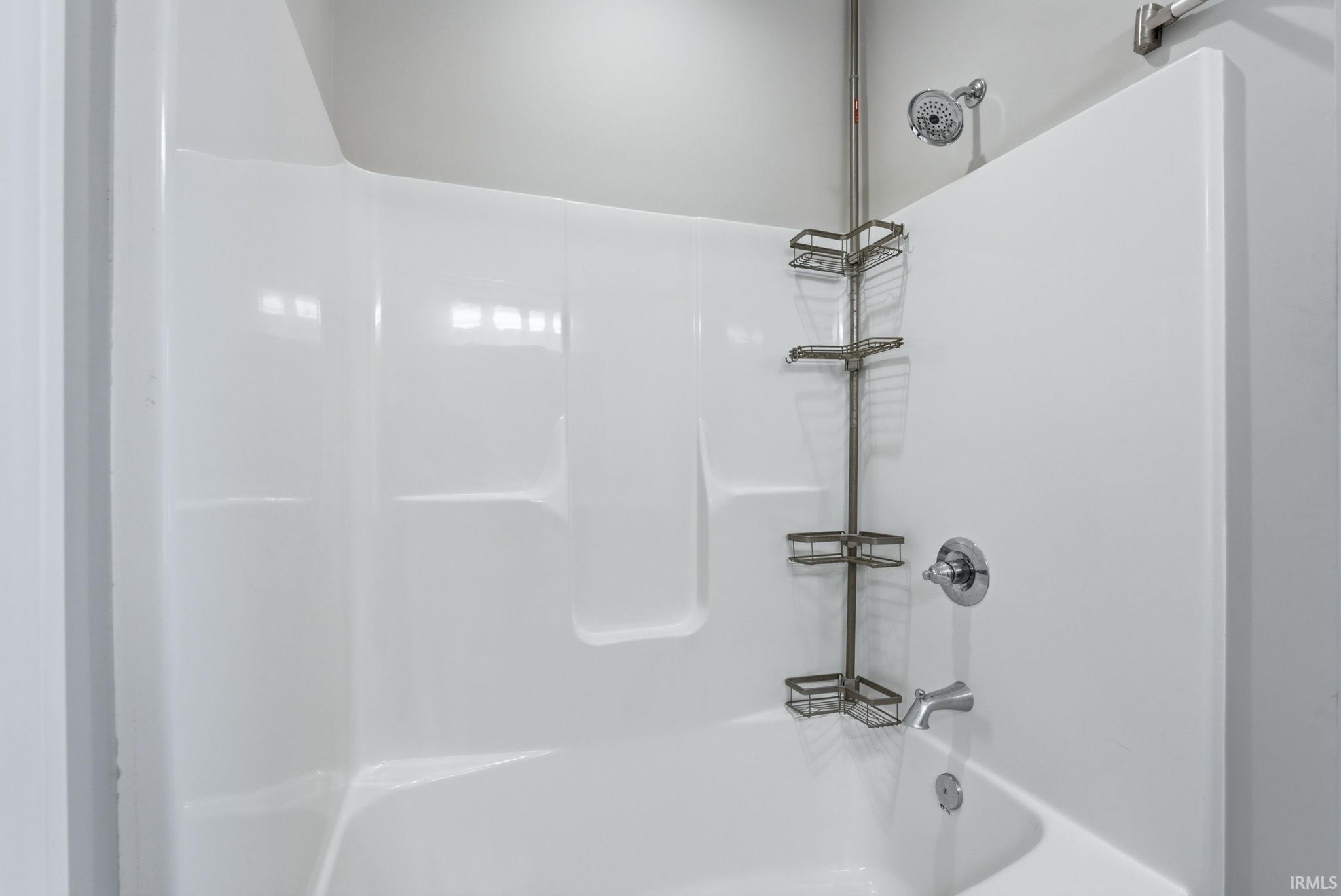 Bathroom featuring tub / shower combination