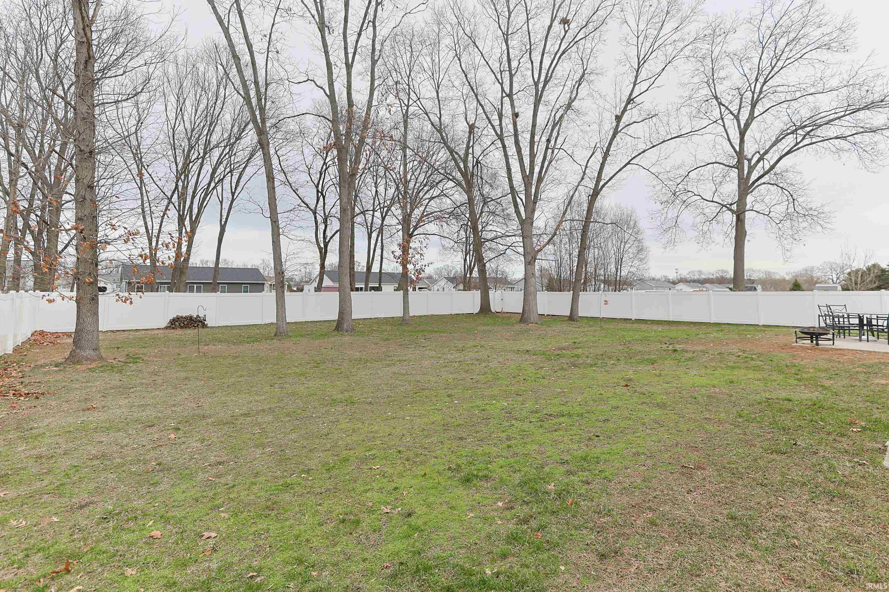View of fenced backyard