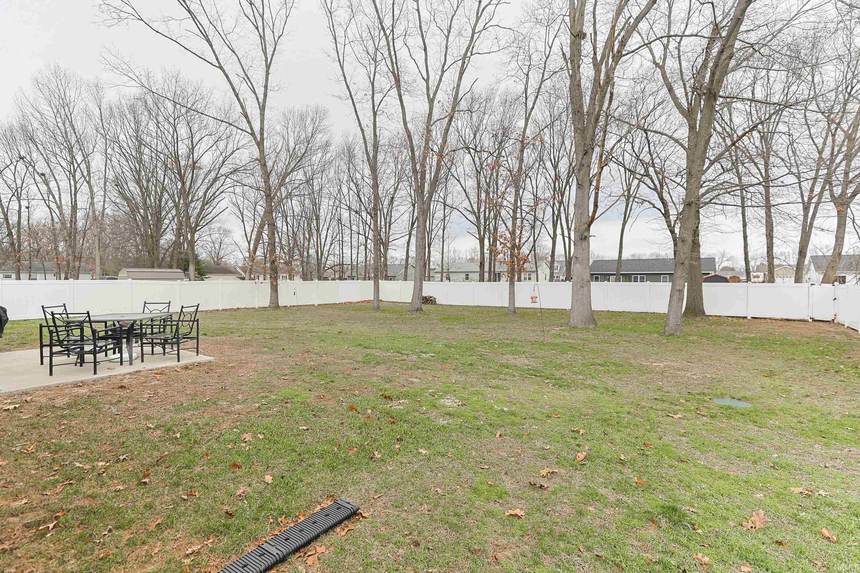 Fenced backyard featuring a patio area