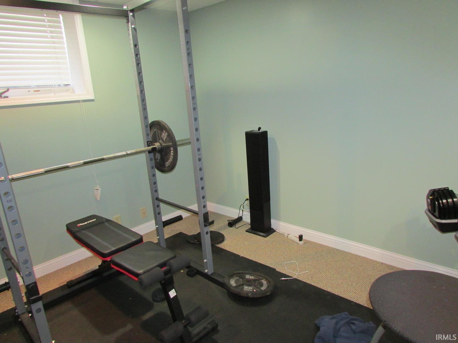 Workout room with baseboards