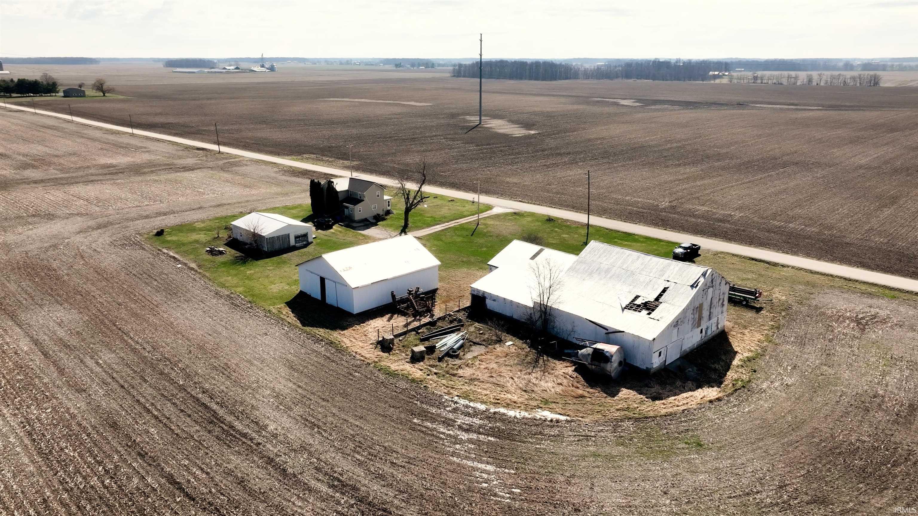 Overview of rural landscape featuring extensive farmland