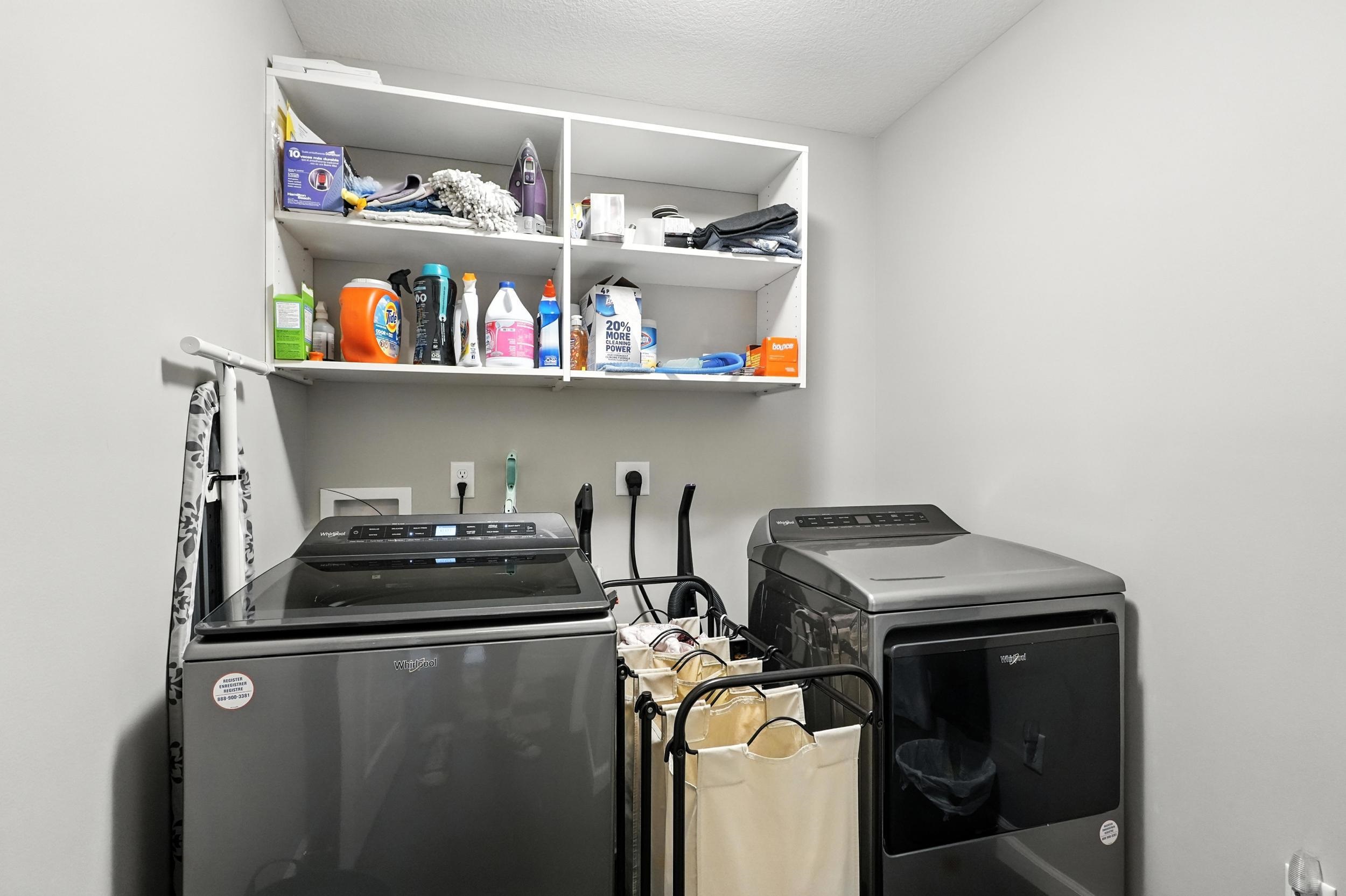 Laundry area featuring washing machine and dryer