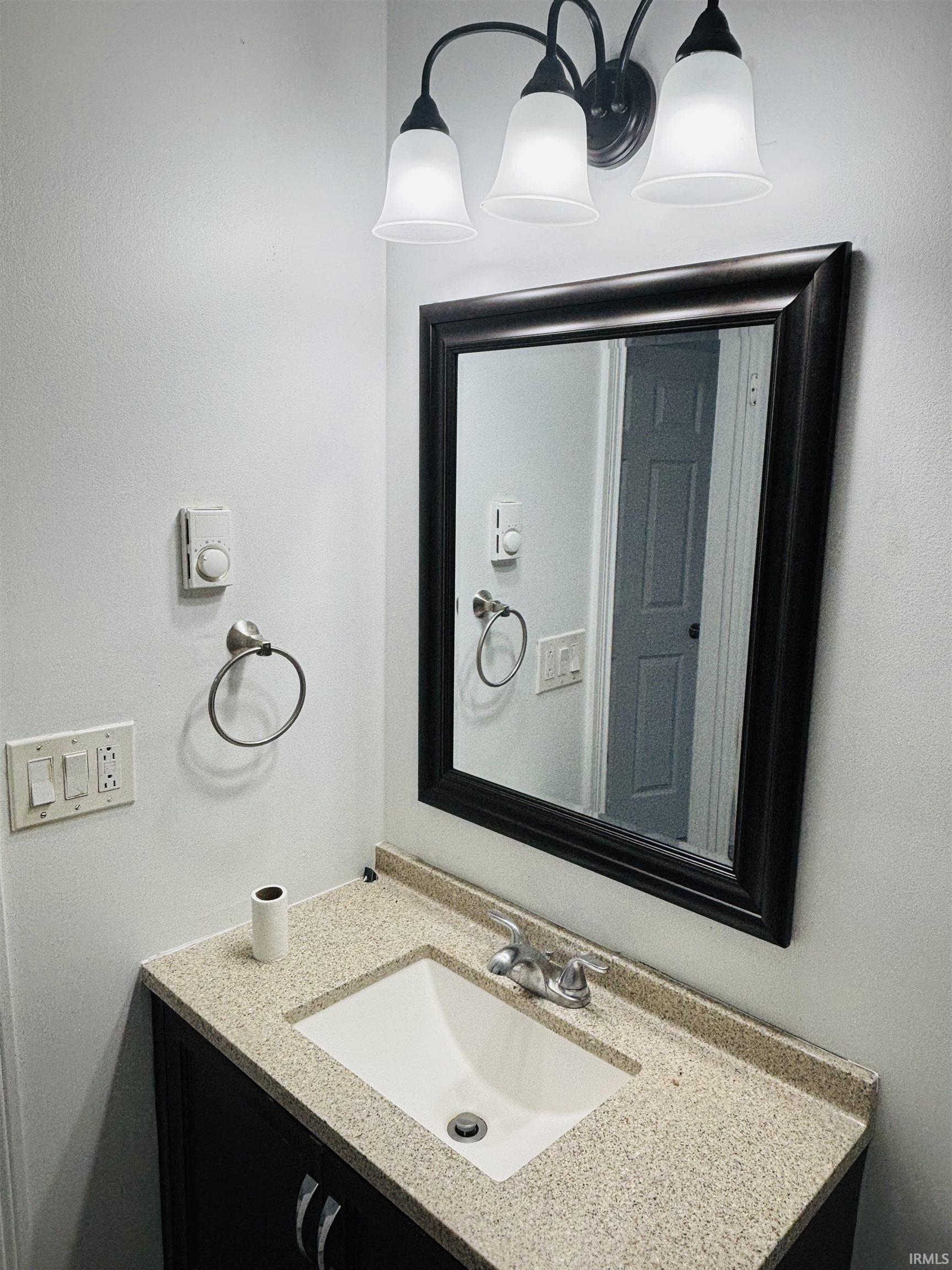 Bathroom featuring vanity