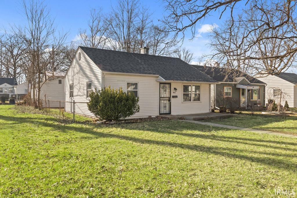 New england style home featuring a chimney