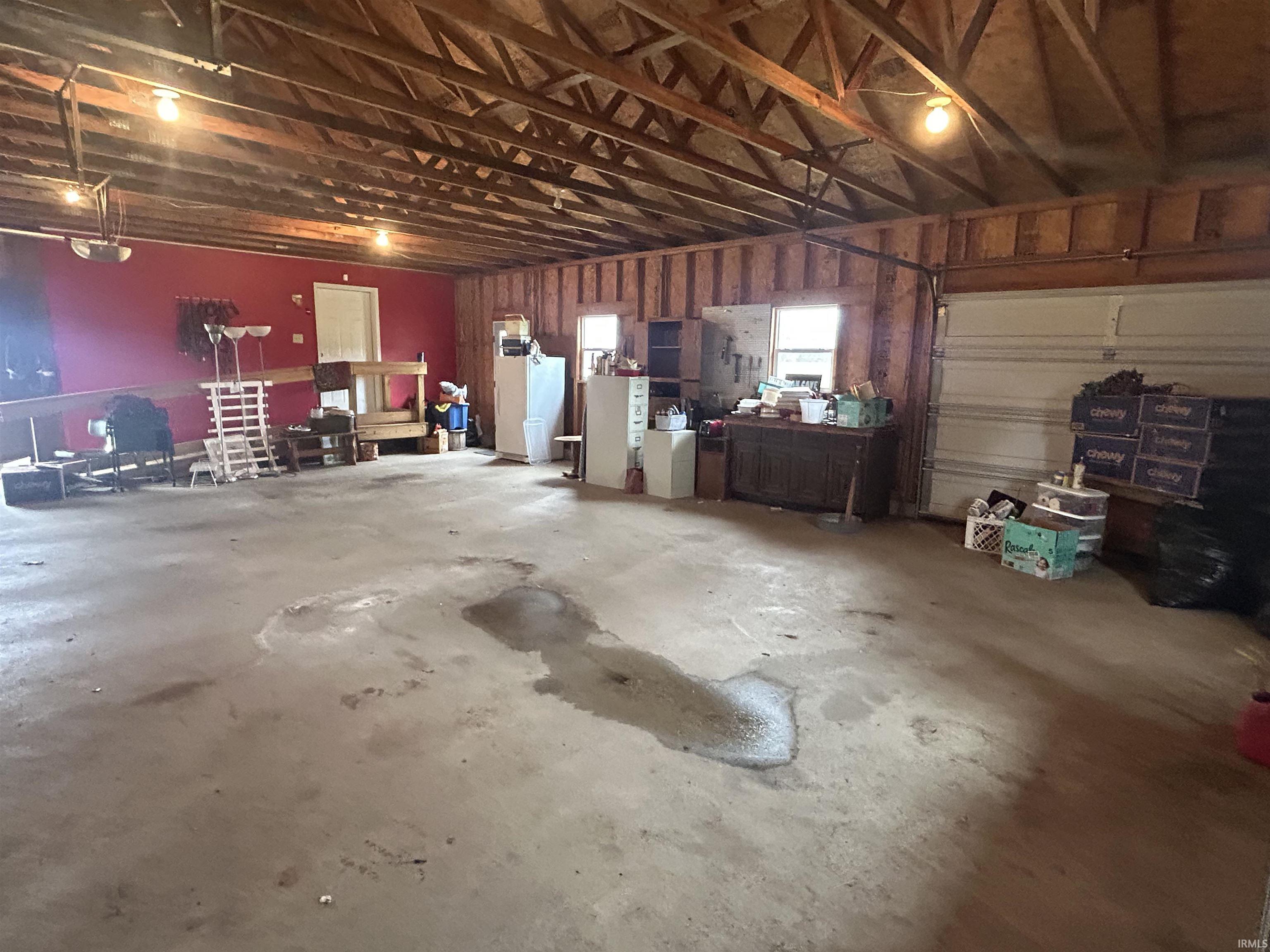 Garage featuring fridge