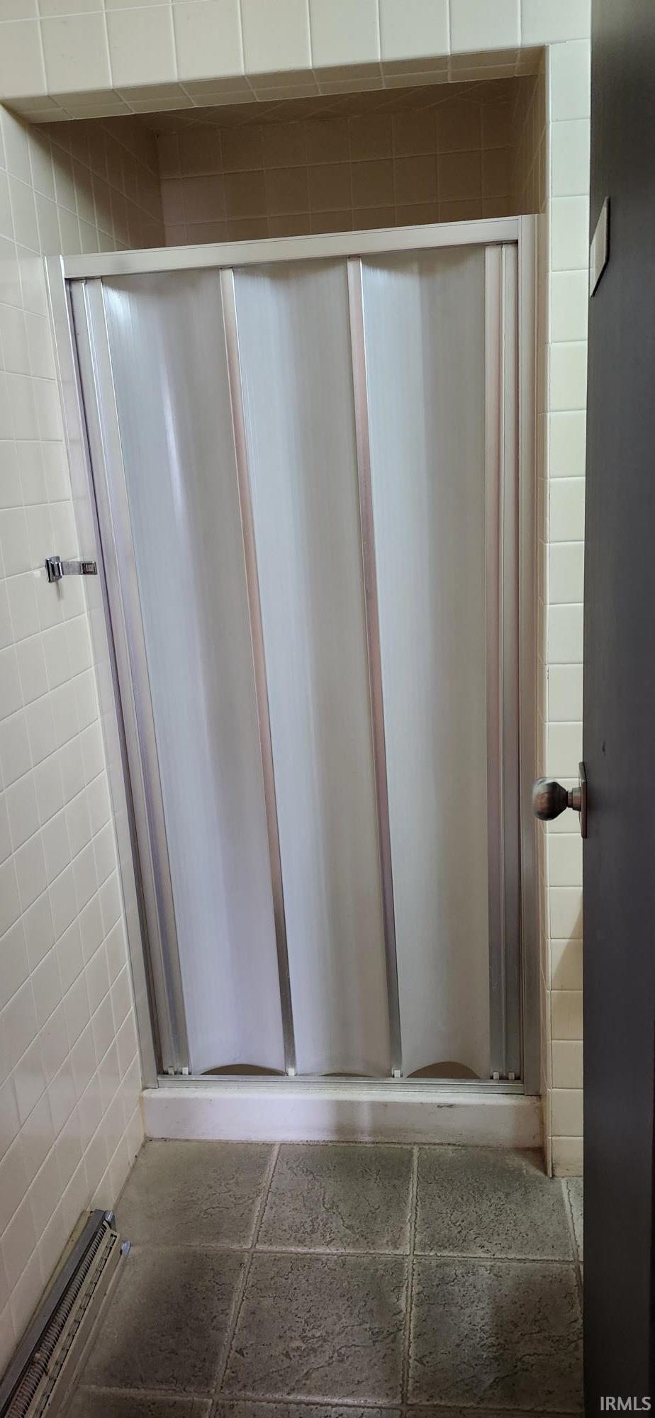 Bathroom with a stall shower