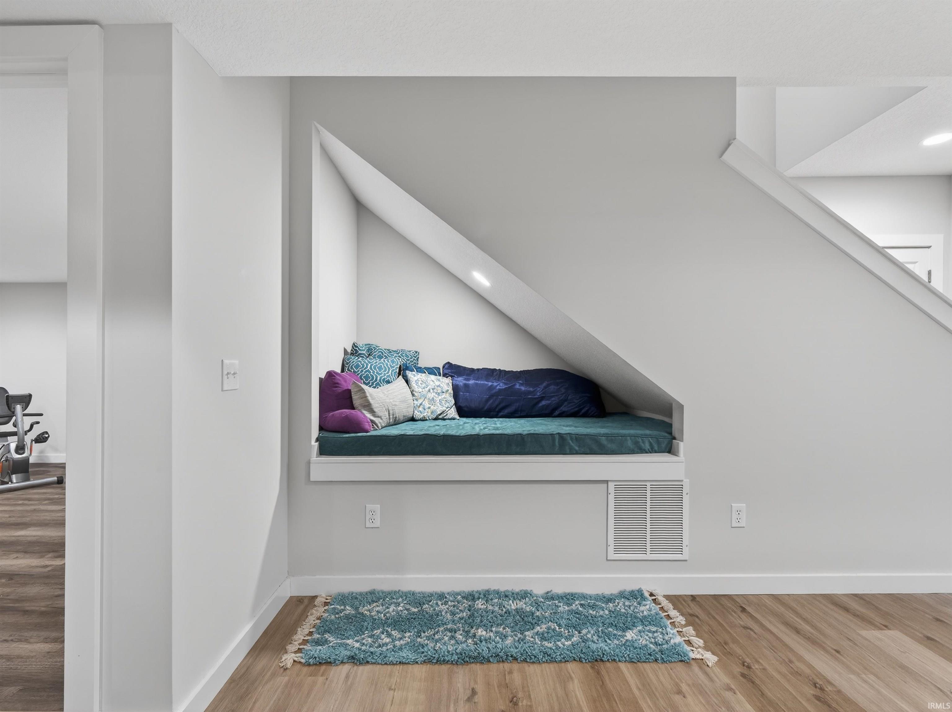 Unfurnished bedroom featuring light wood finished floors