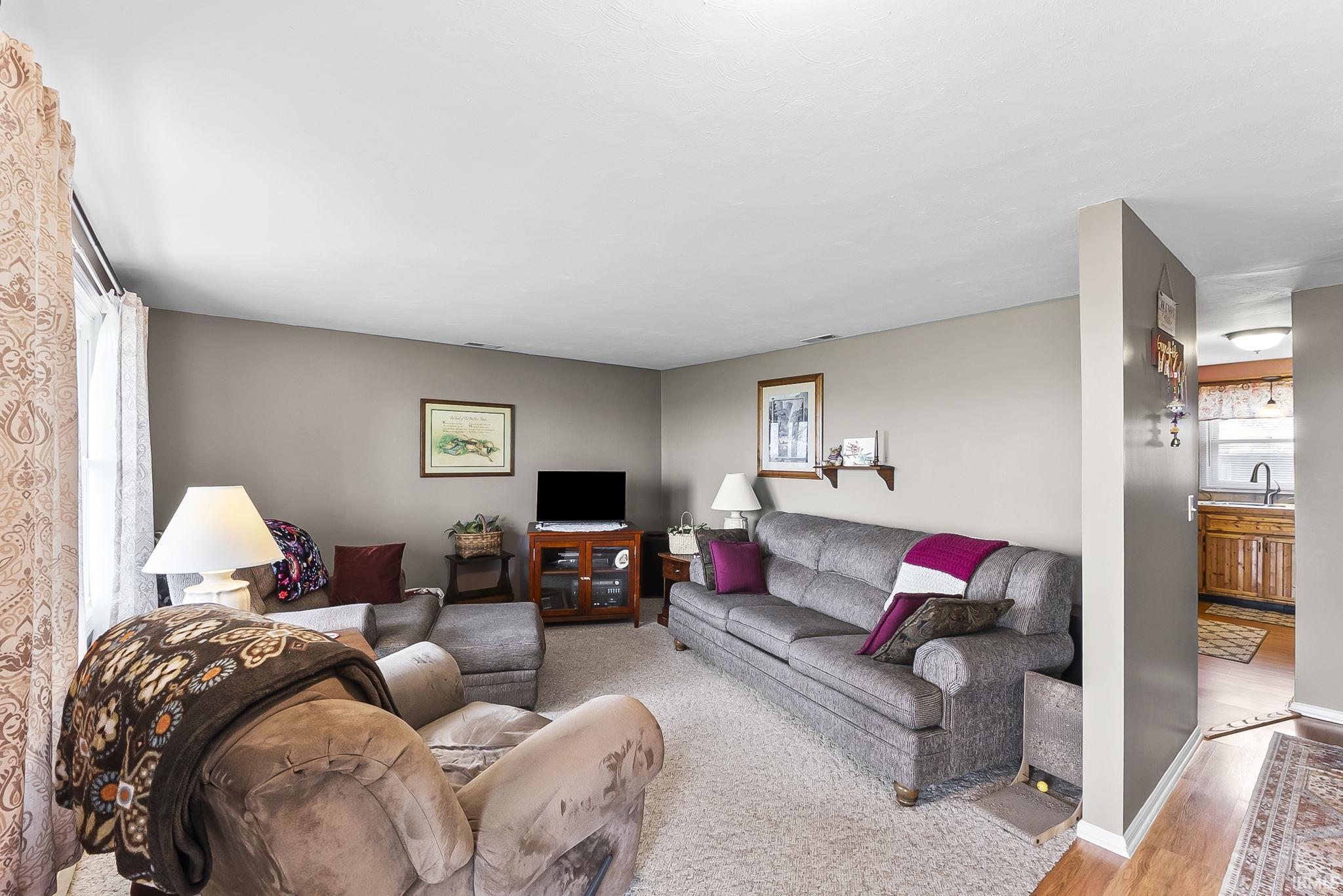 Living area featuring light wood-type flooring