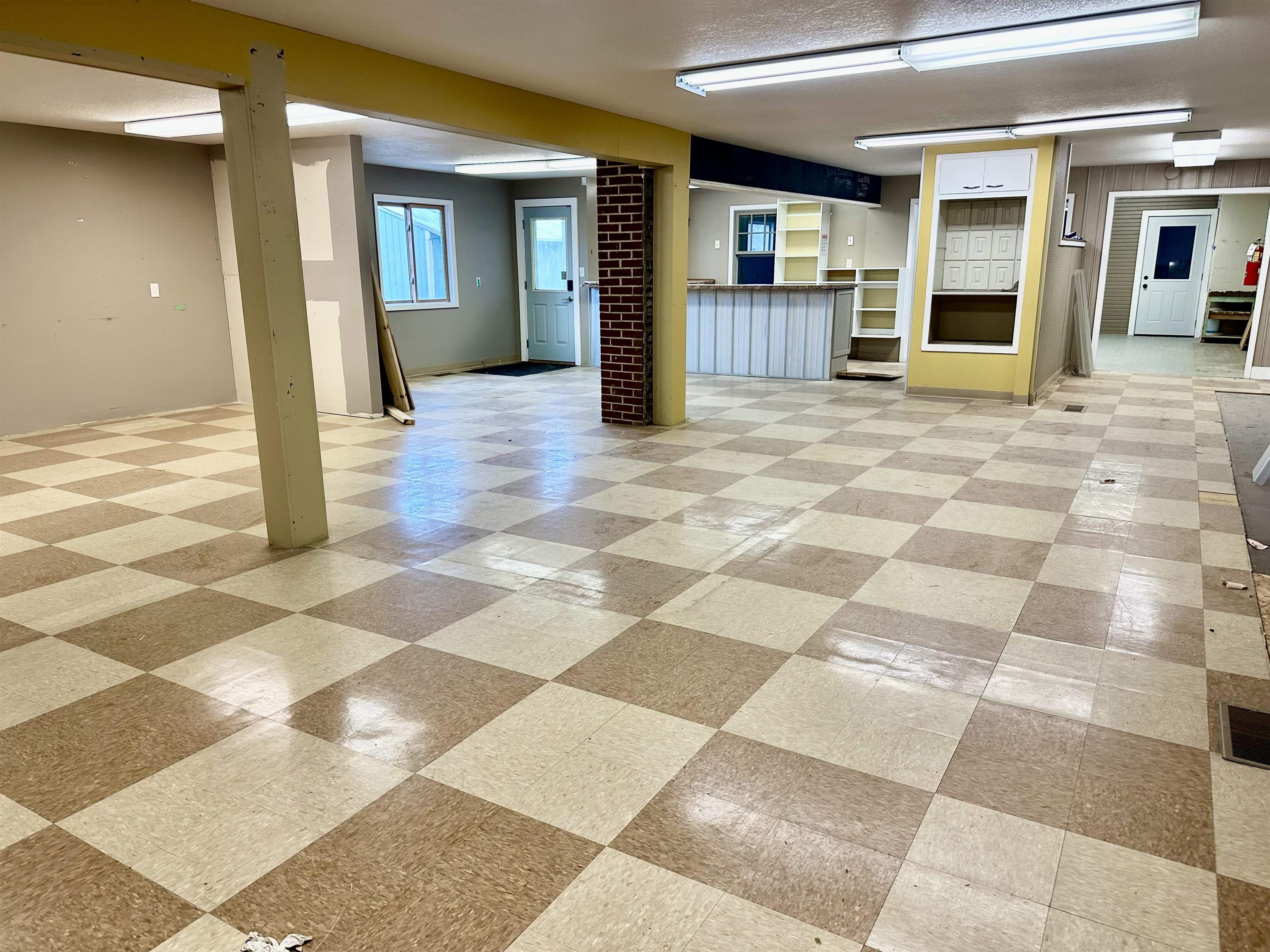 Below grade area featuring light floors