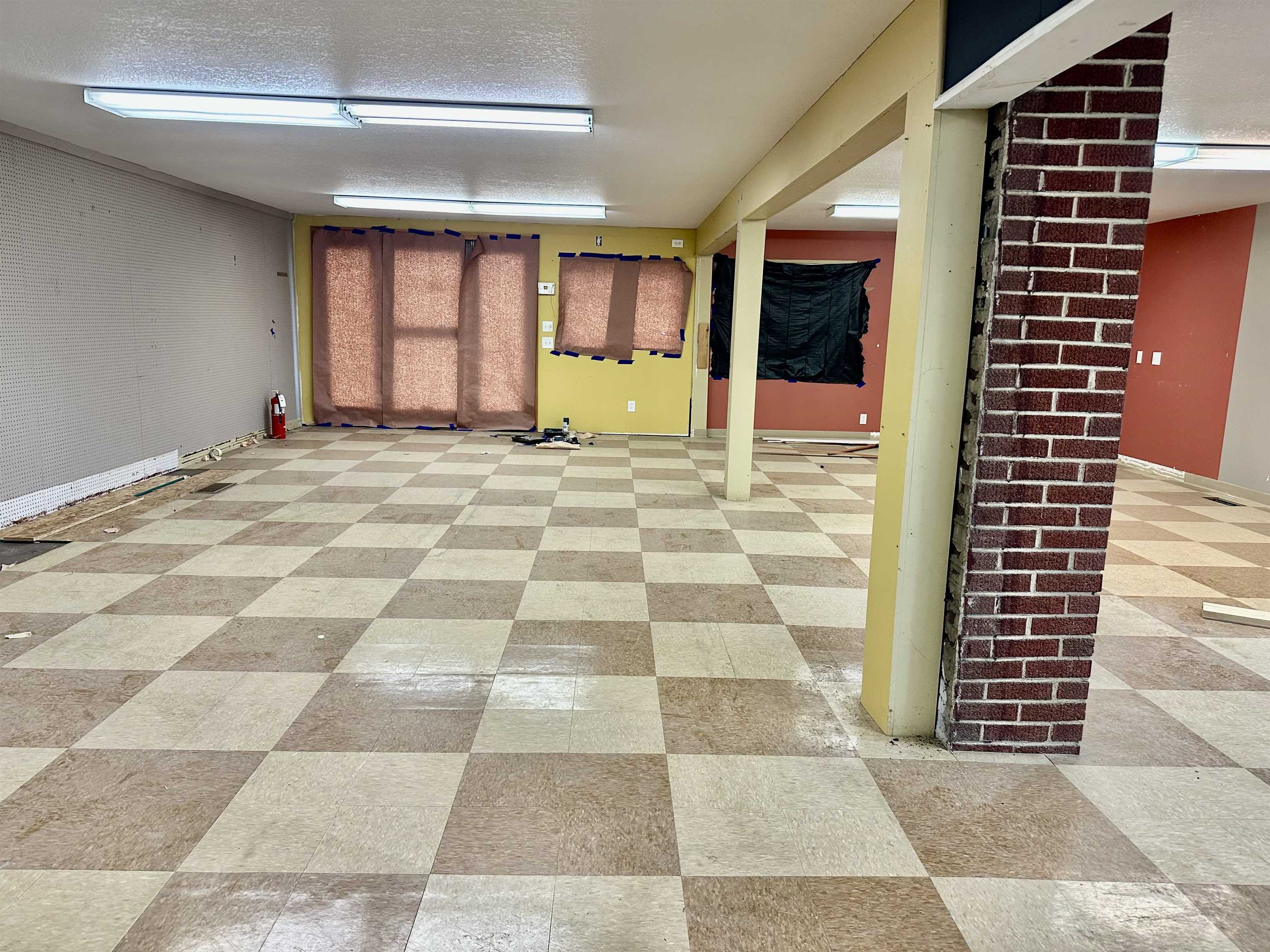 Empty room featuring light floors