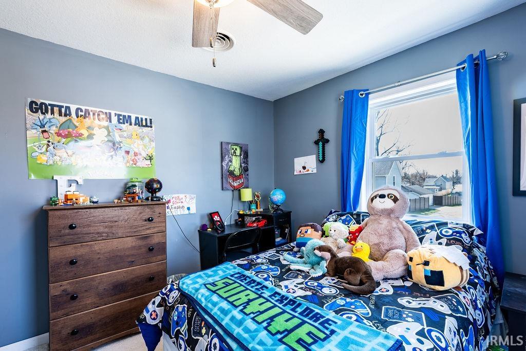 Bedroom with a ceiling fan