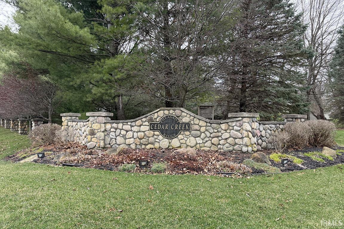 Community sign with a lawn