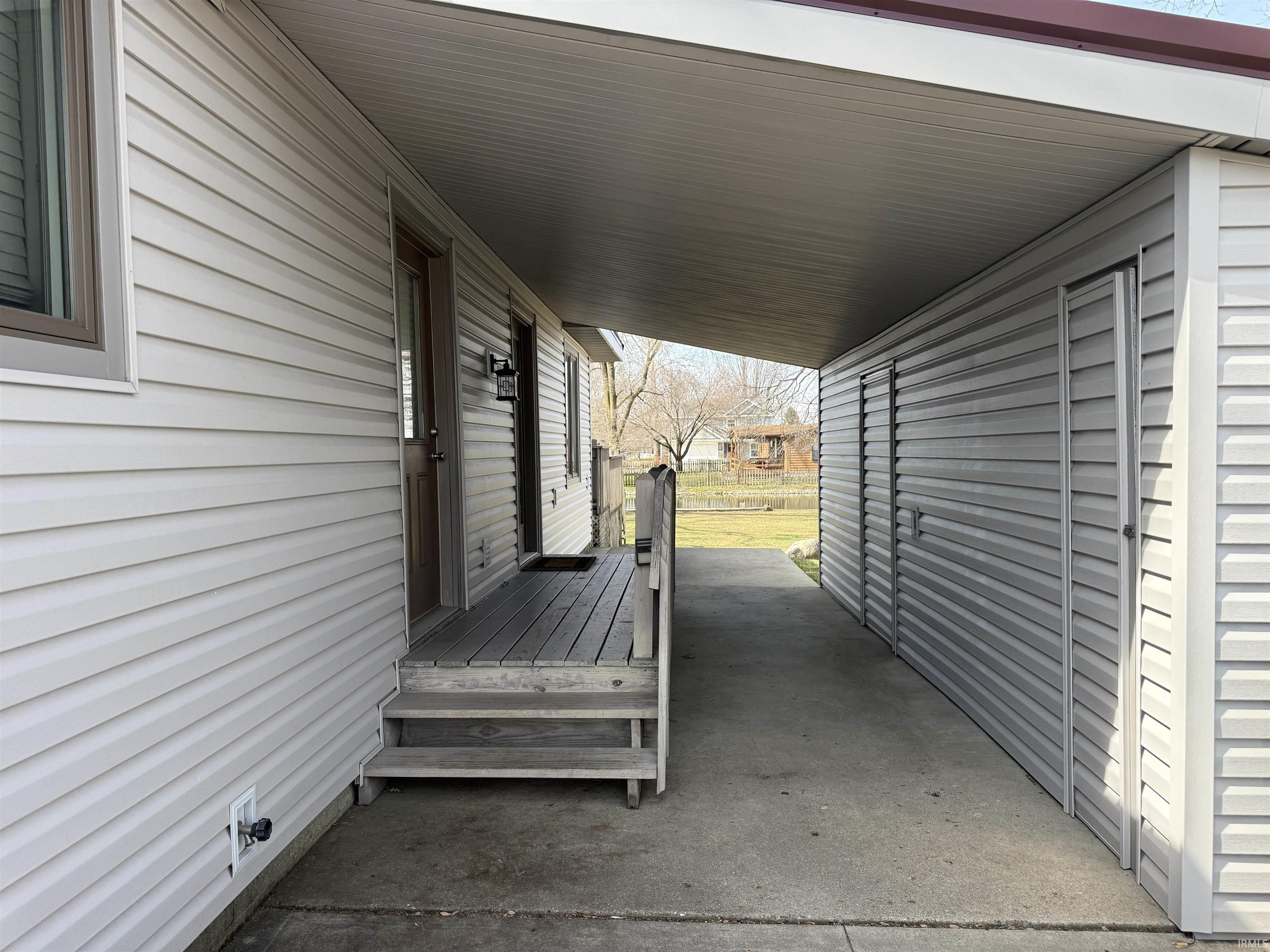 View of covered side entrance.