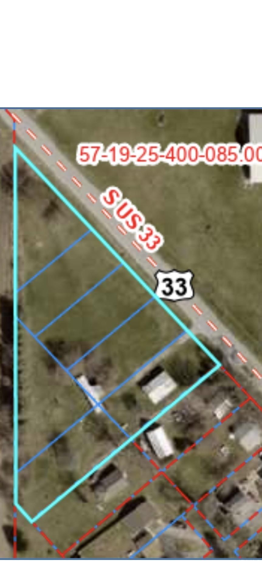 Aerial overview of property's location with property parcel outlined