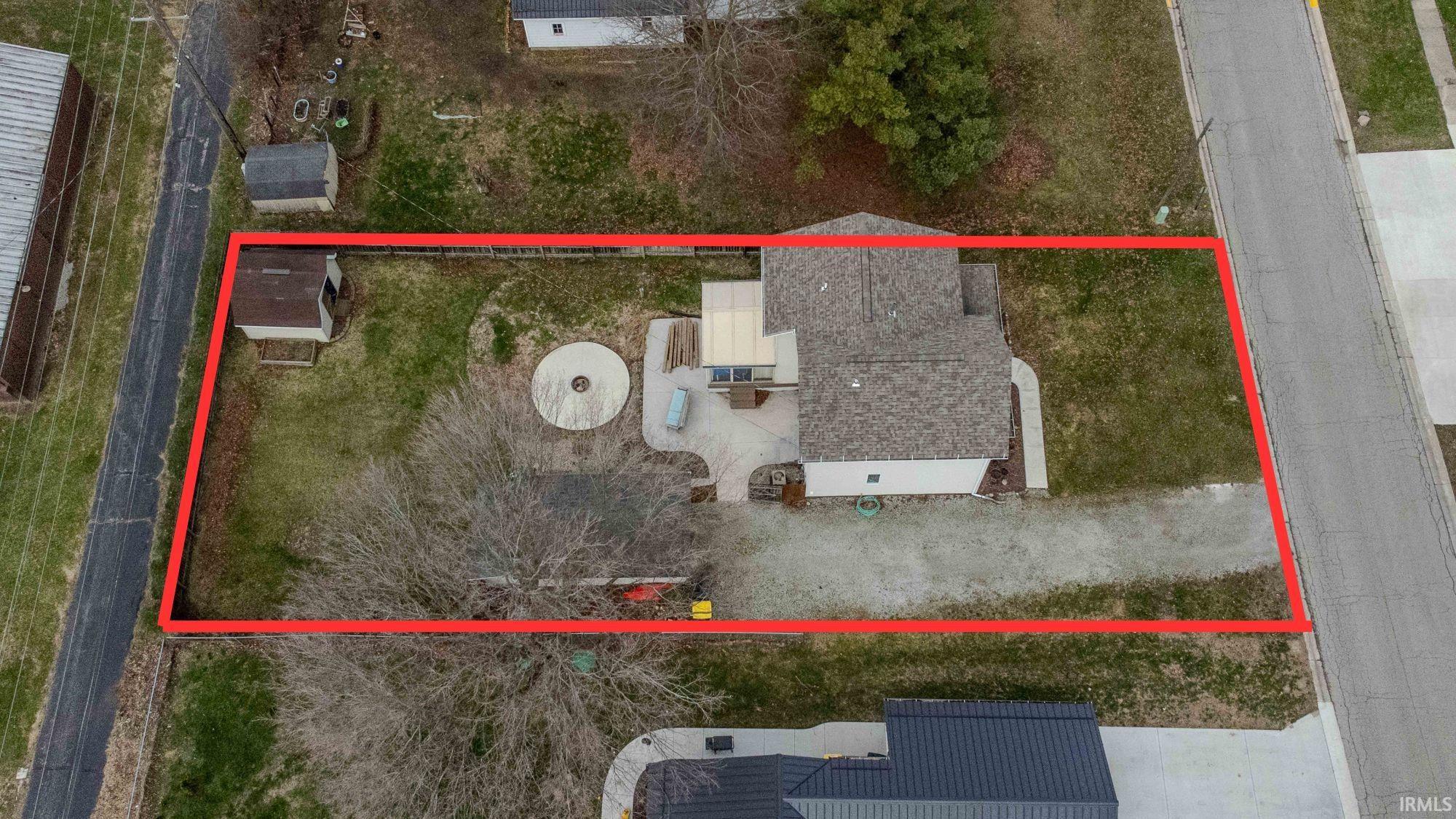 Aerial overview of property's location with property parcel outlined