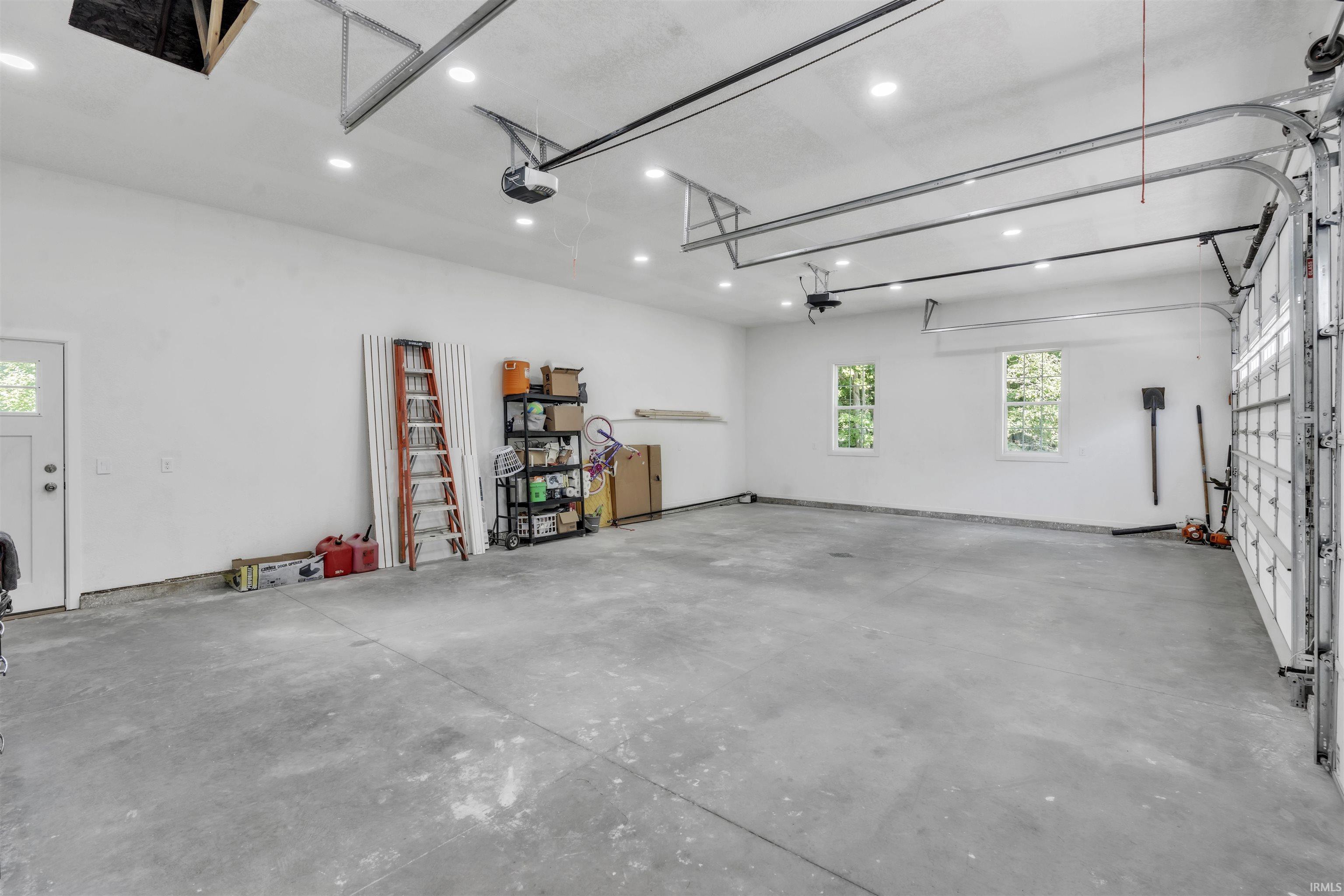 Garage featuring recessed lighting