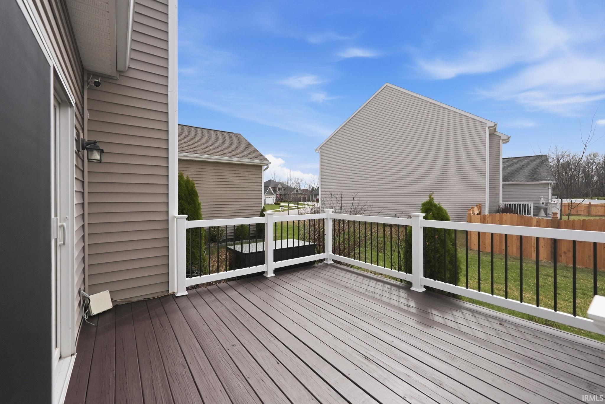 Wooden deck featuring a residential view