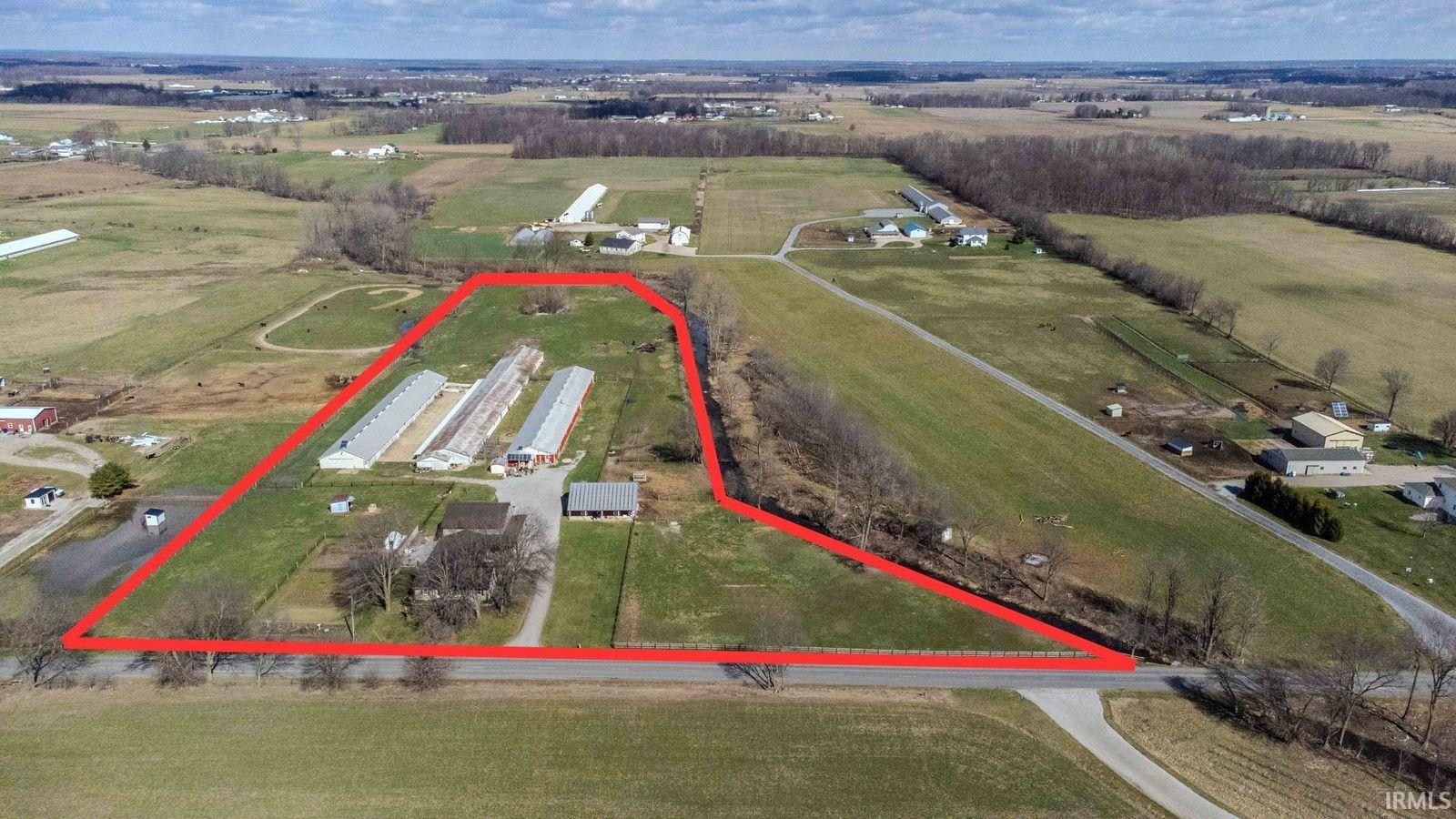 Overview of rural landscape featuring property boundaries highlighted