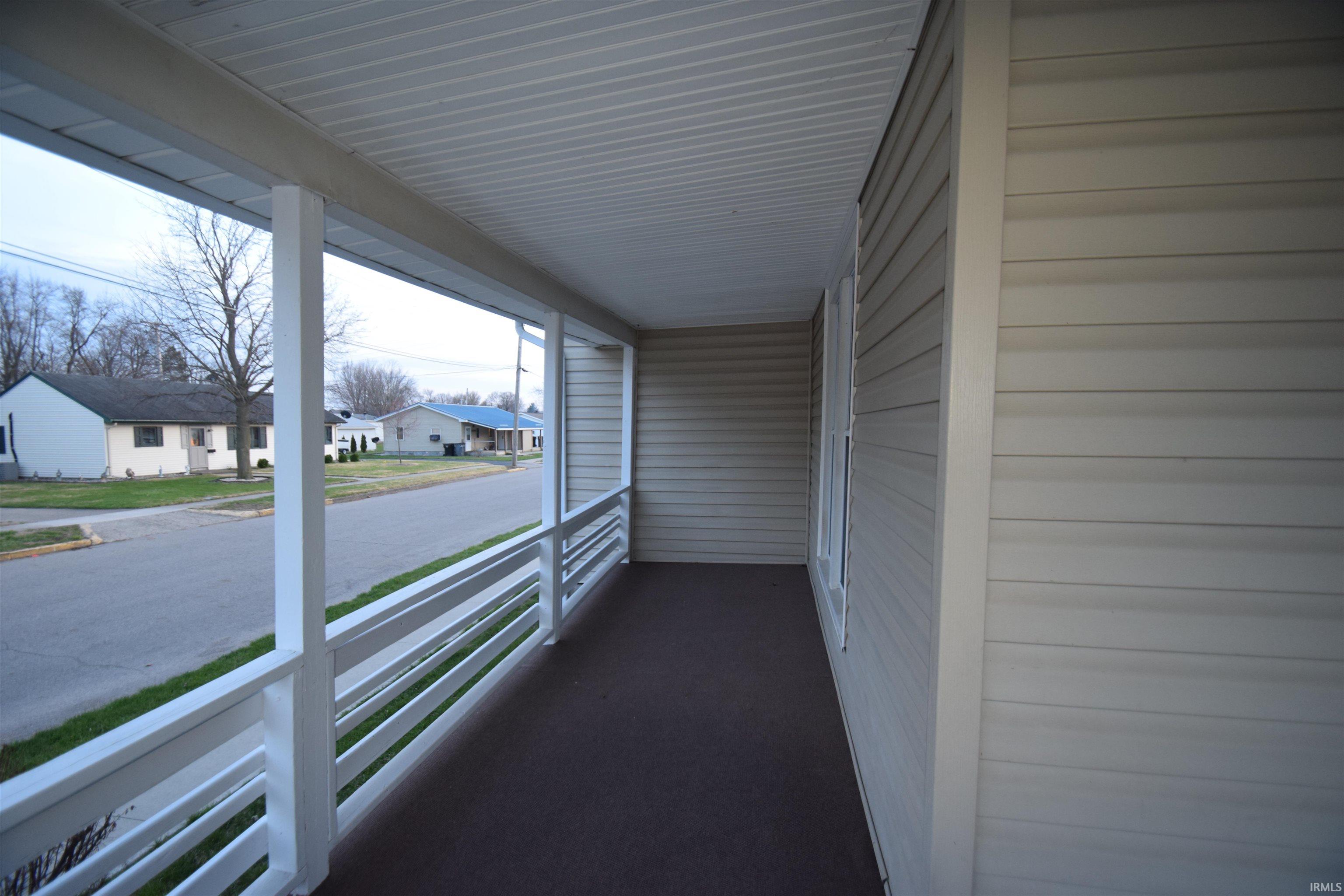 Porch featuring a residential view