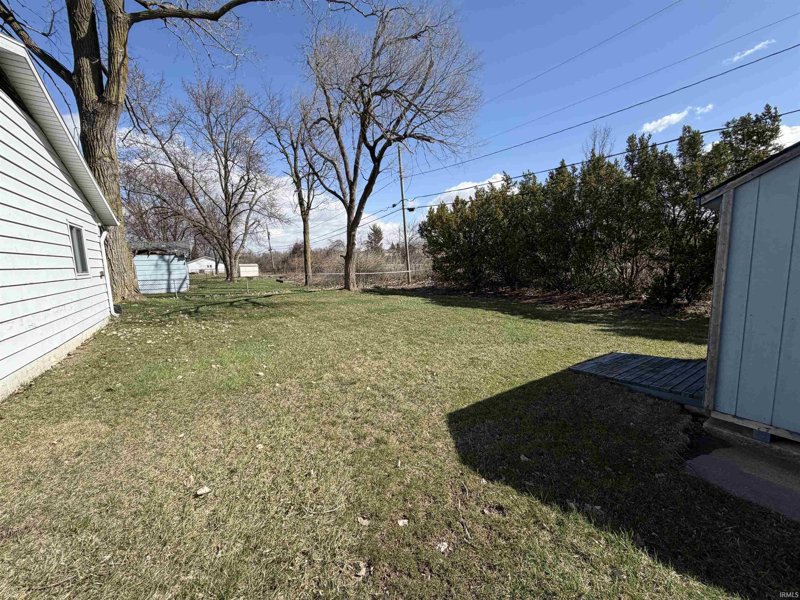 View of yard featuring an outdoor structure