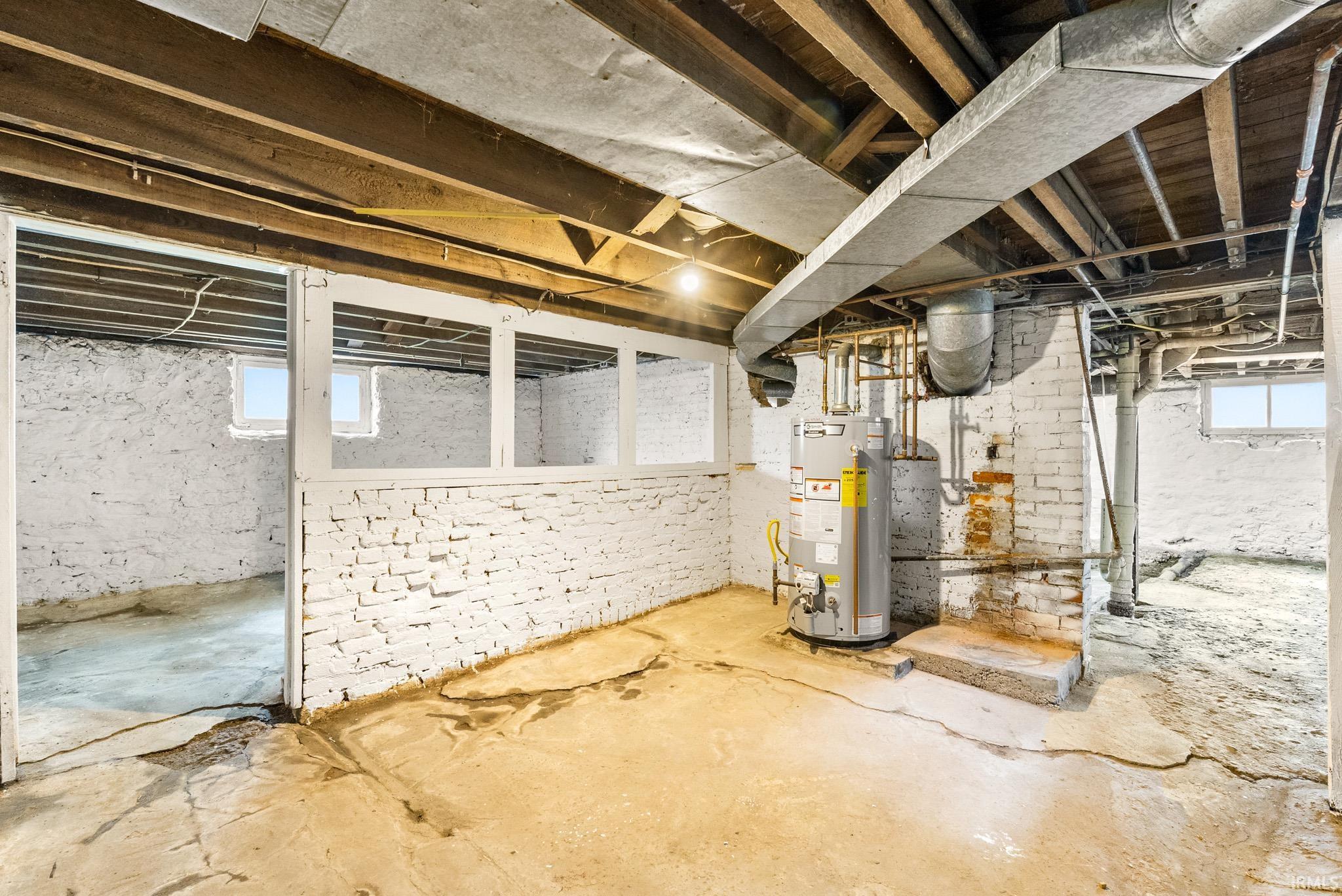 Basement featuring gas water heater
