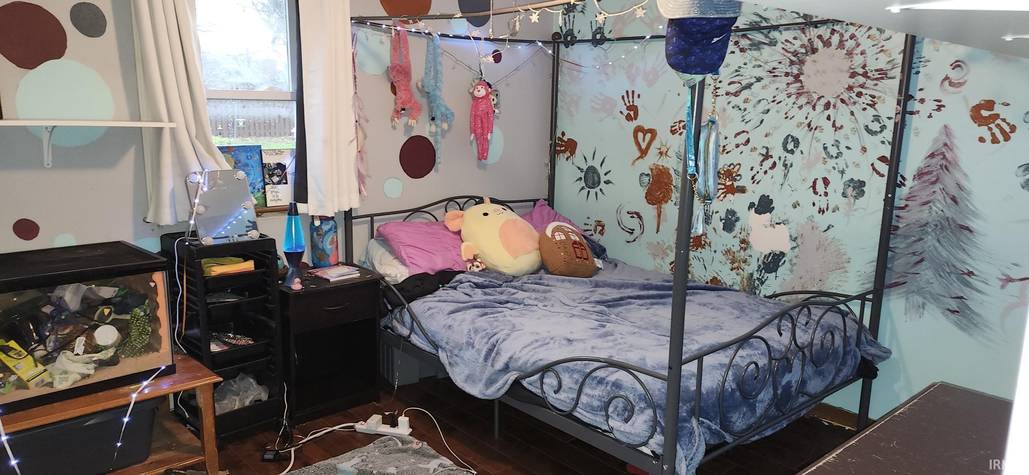 Bedroom featuring wood finished floors