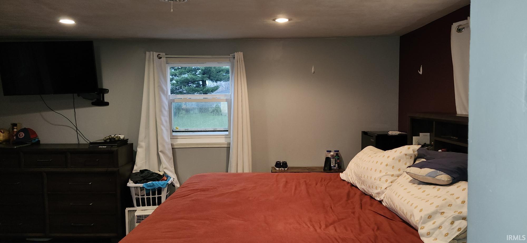 Bedroom with recessed lighting