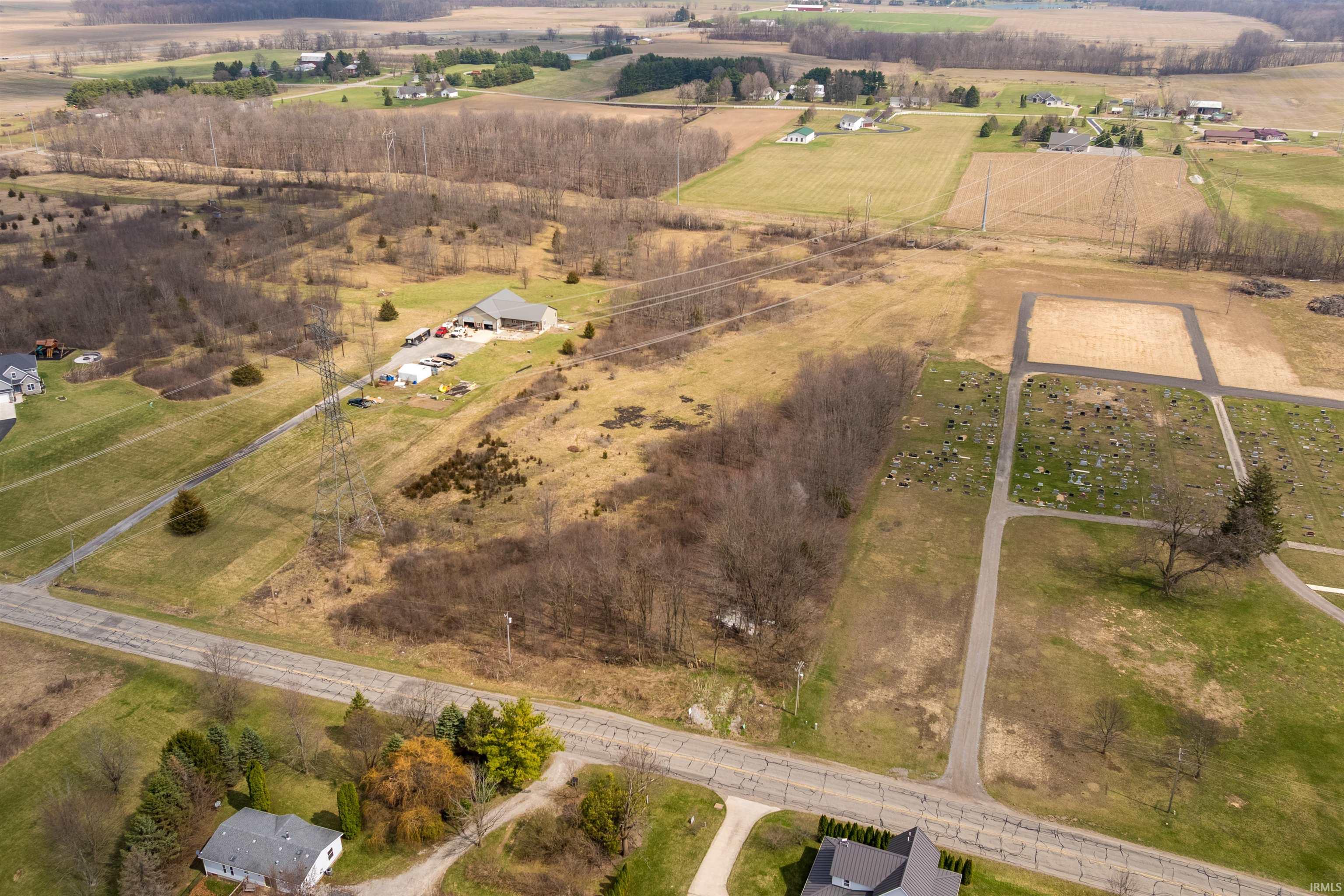 View of rural area featuring large plots for crops