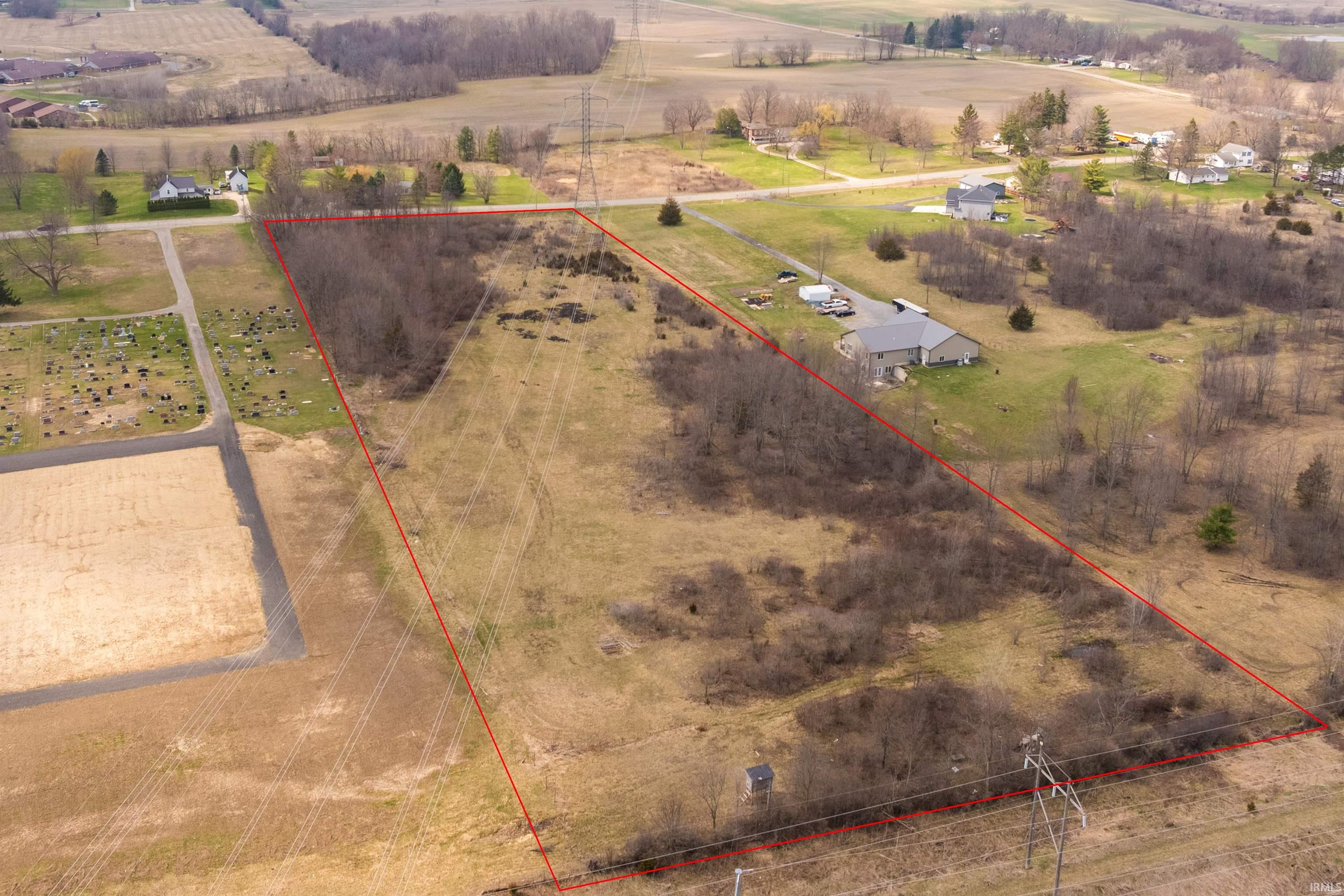 Overview of rural landscape with property parcel outlined