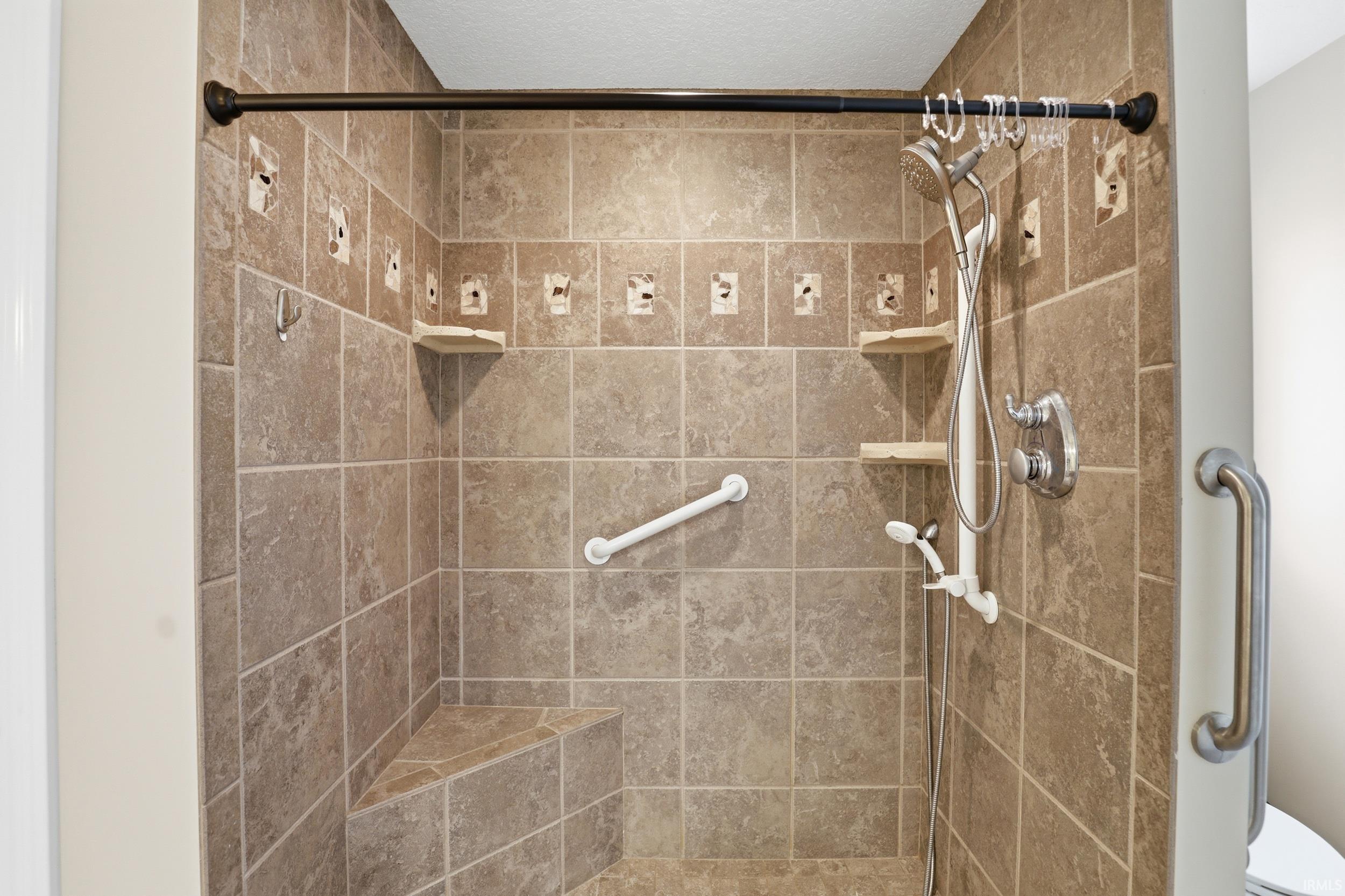Bathroom with tiled shower