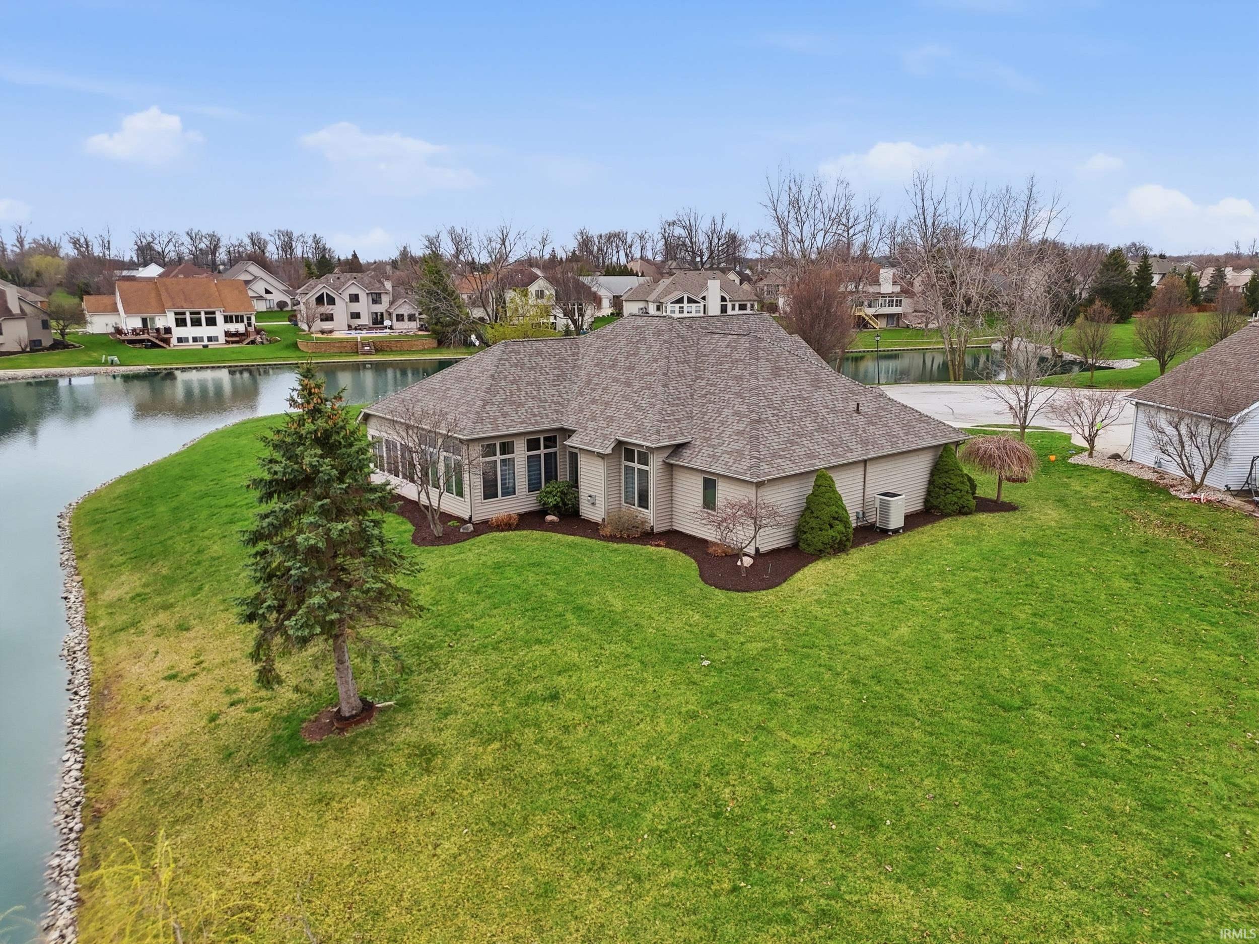 Aerial view of residential area with a large body of water