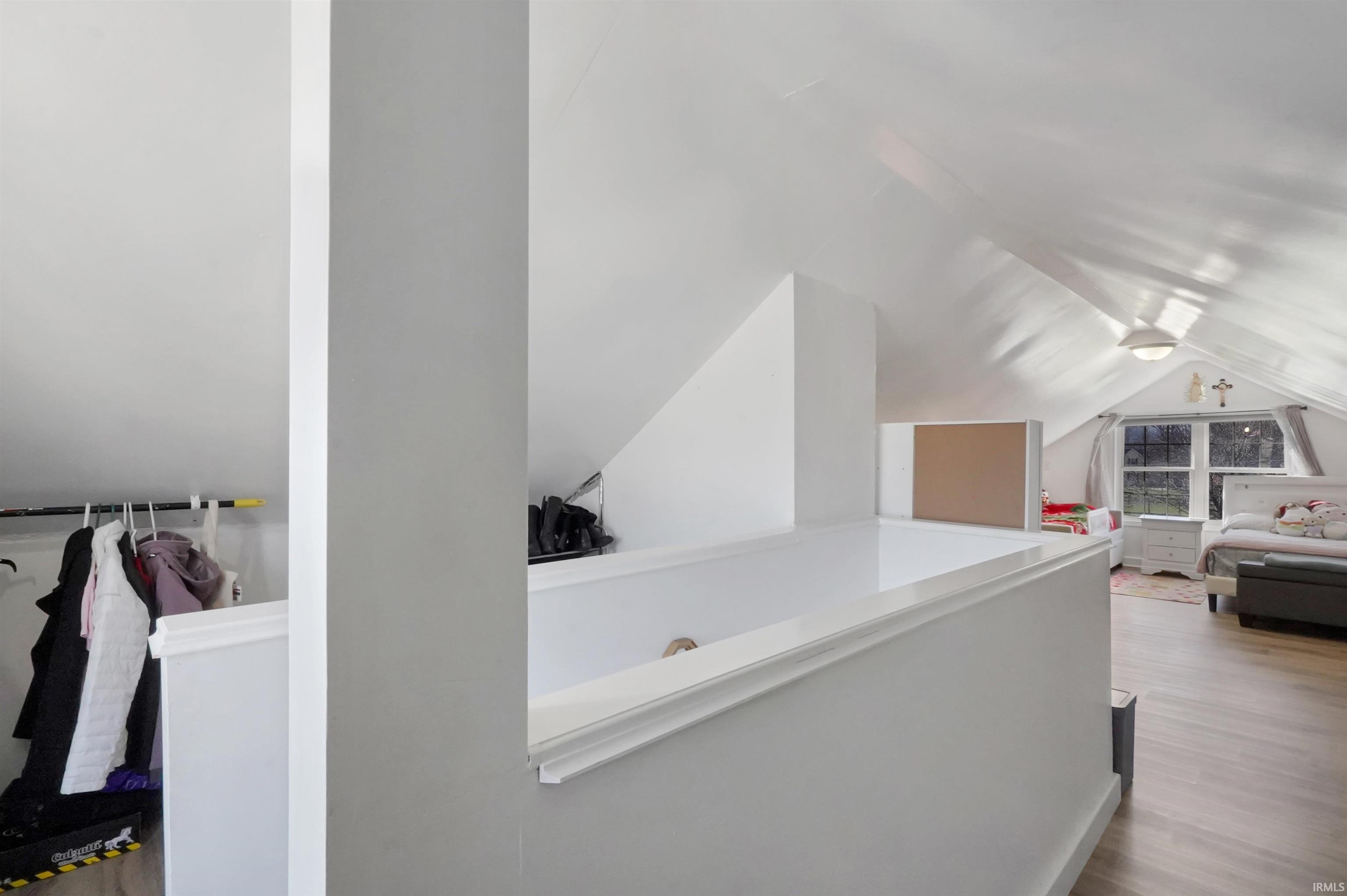 Bedroom featuring wood finished floors