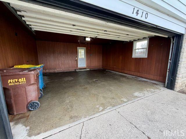 Garage with wood walls