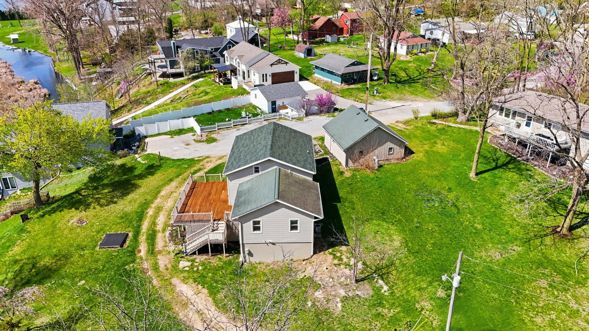 Aerial view of residential area with a nearby body of water