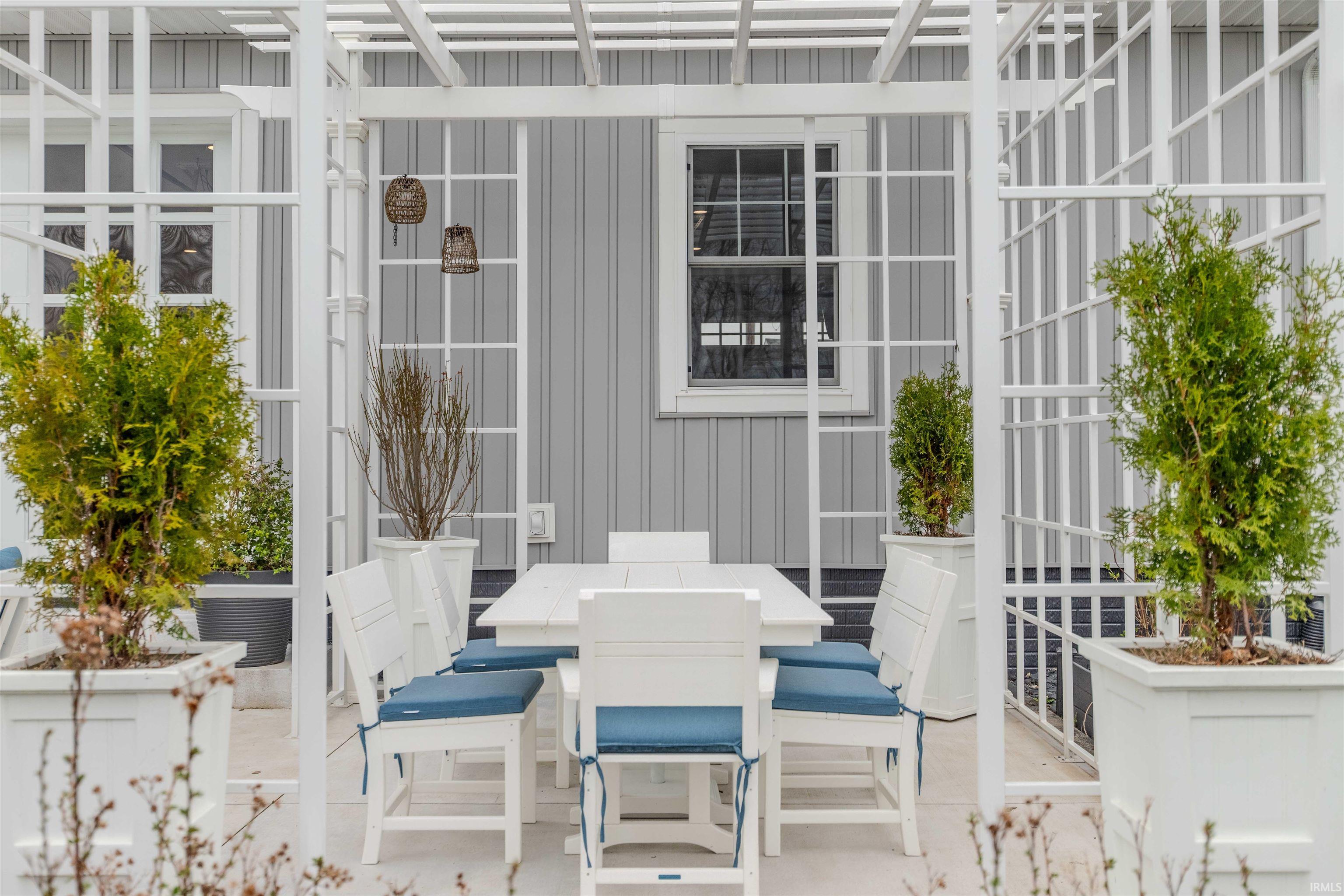 View of patio featuring outdoor dining area