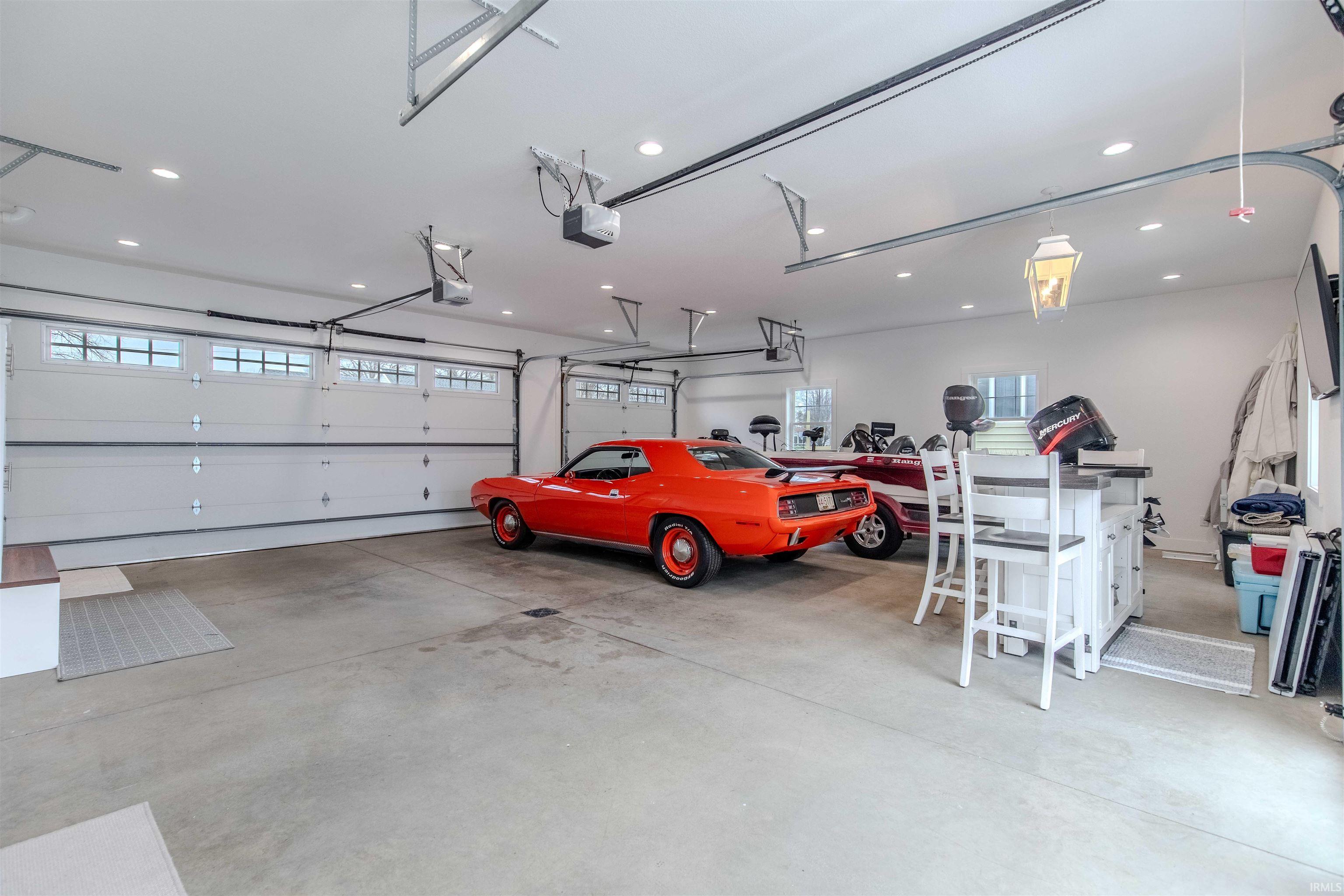 Garage featuring recessed lighting