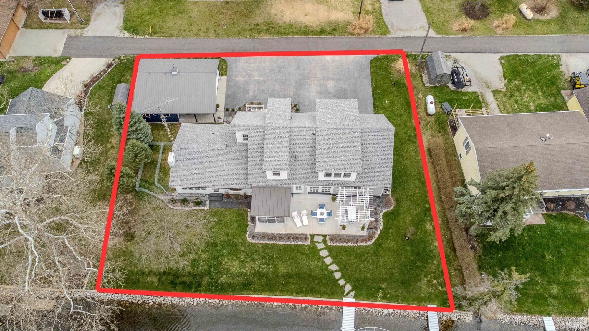 Aerial overview of property's location with property parcel outlined