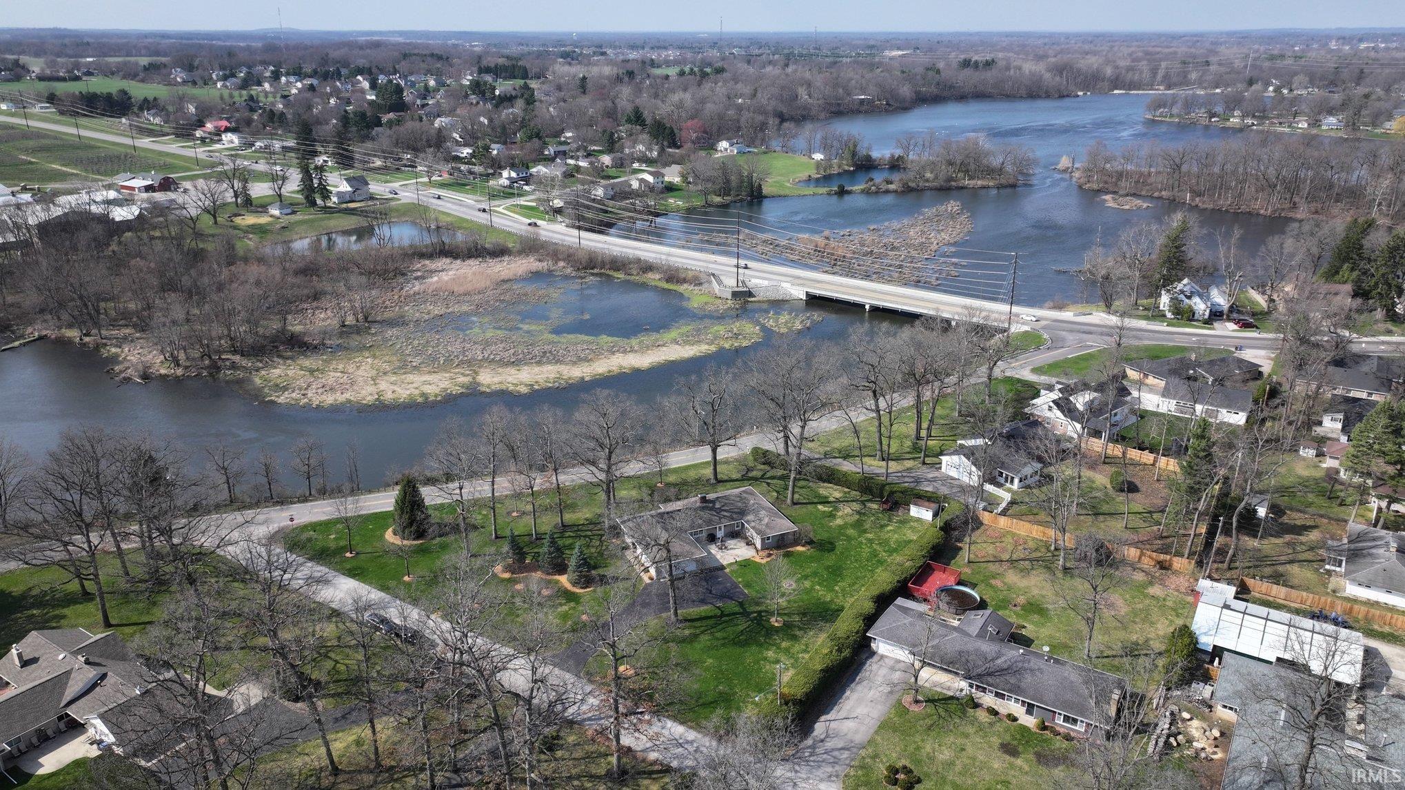 Aerial view of residential area with a nearby body of water