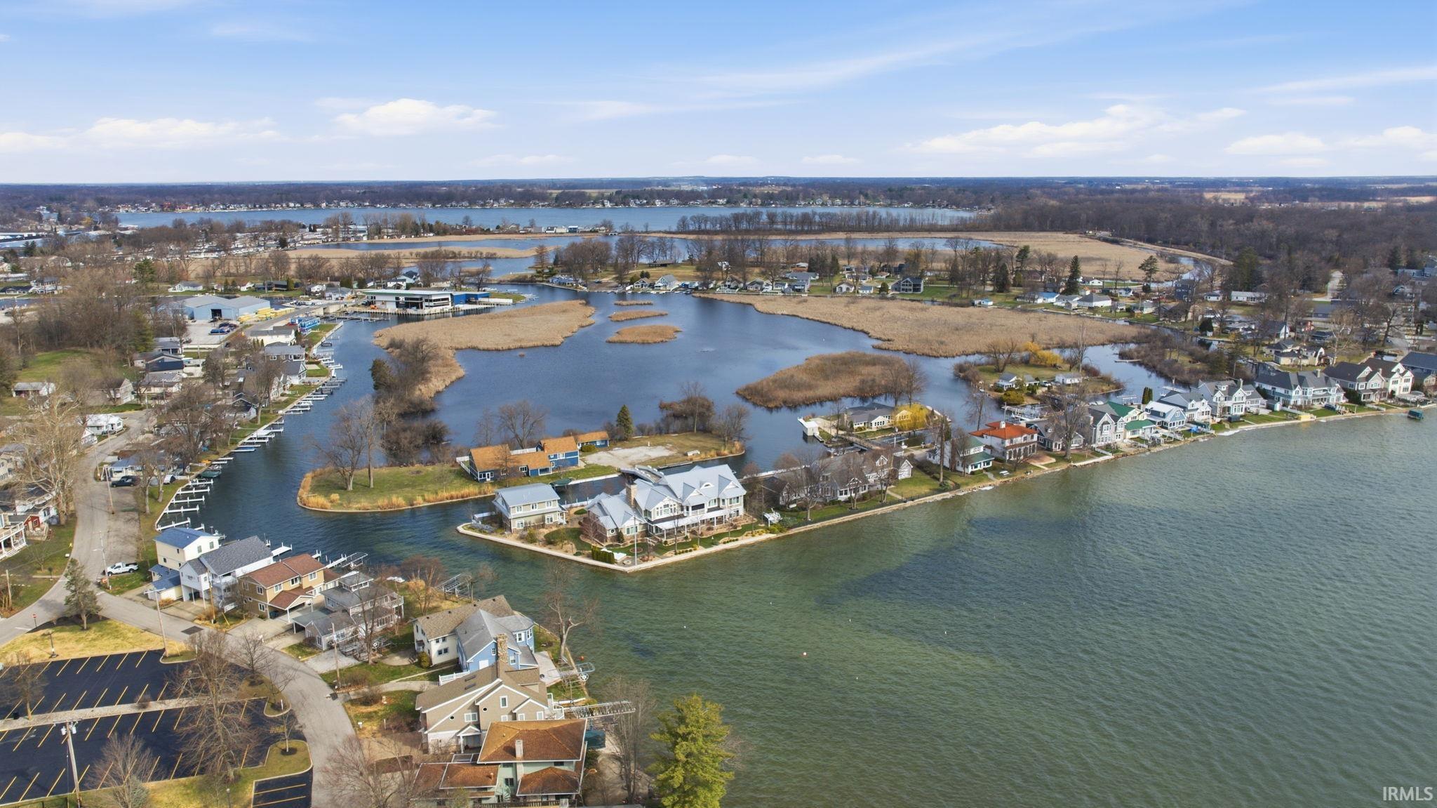Aerial view of residential area with a large body of water