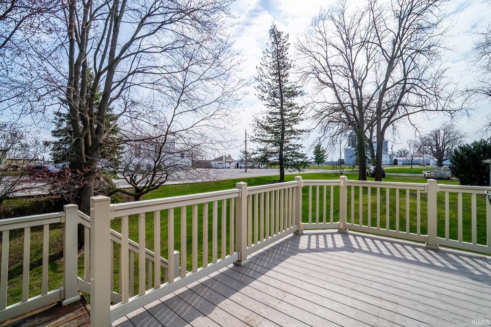 Wooden deck with a yard
