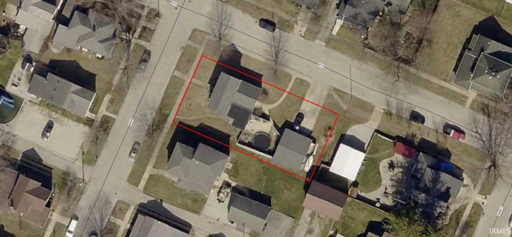 Aerial overview of property's location featuring property parcel outlined