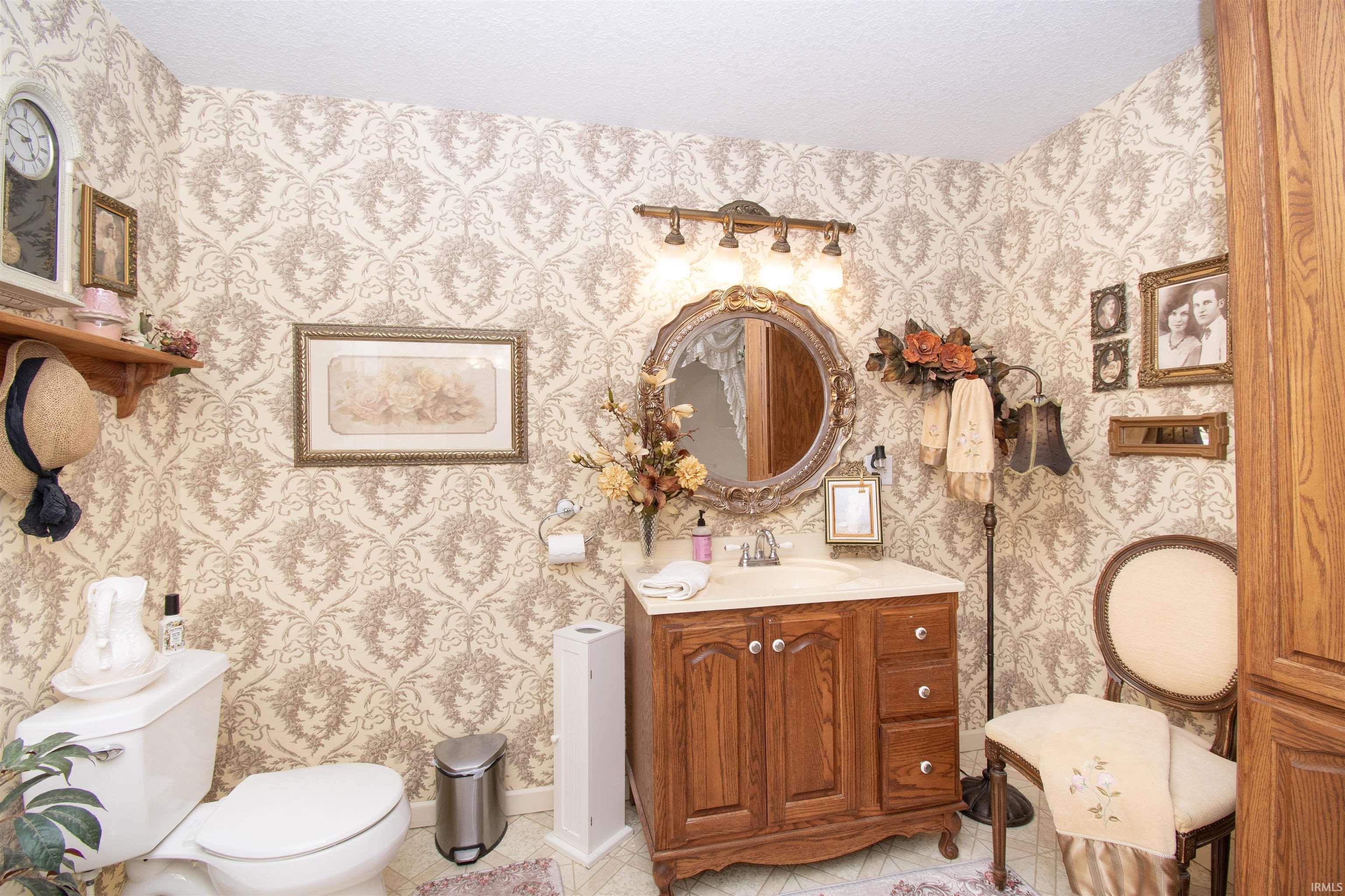 Bathroom featuring vanity and light tile patterned floors