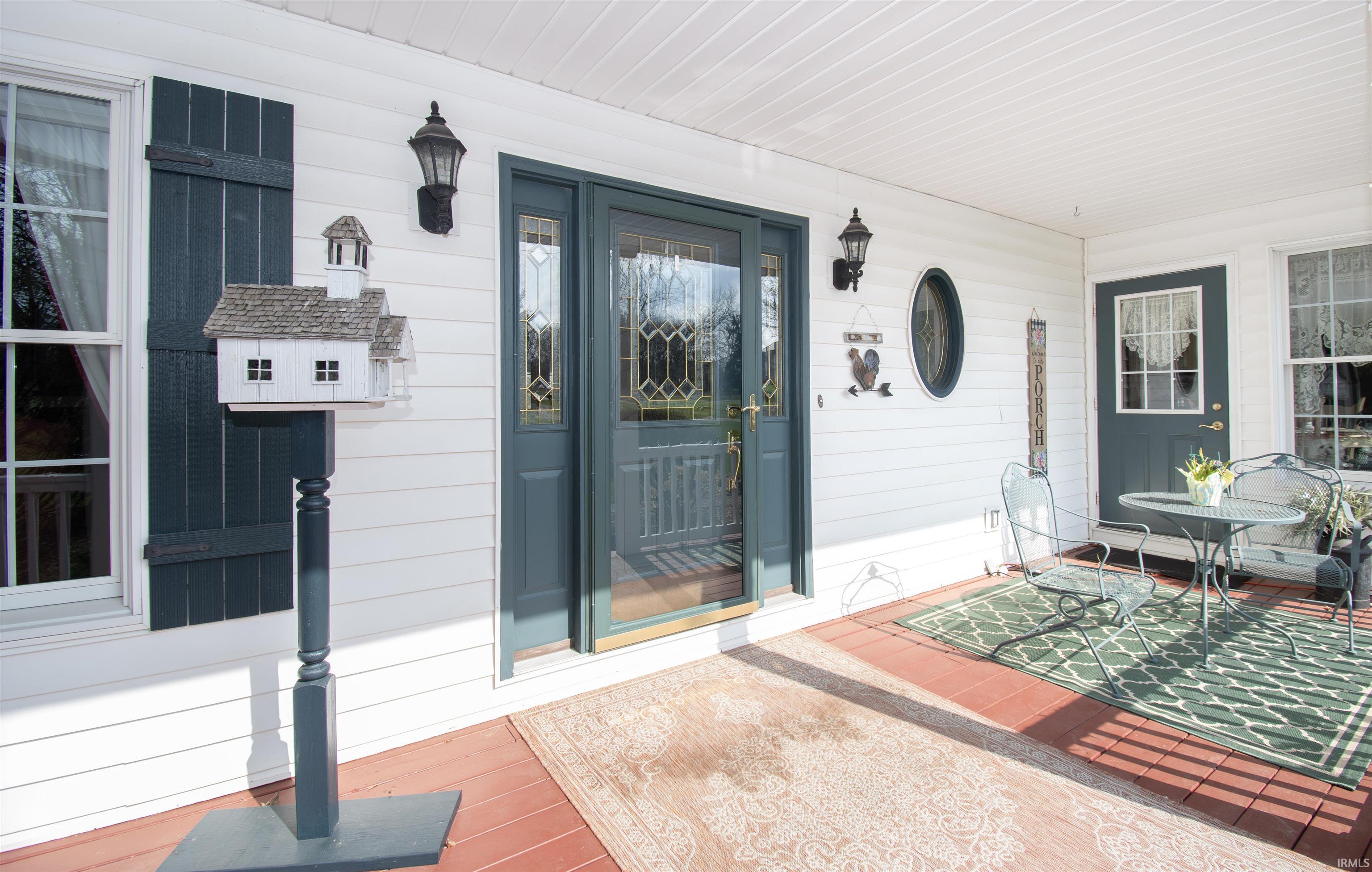 Entrance to property with covered porch