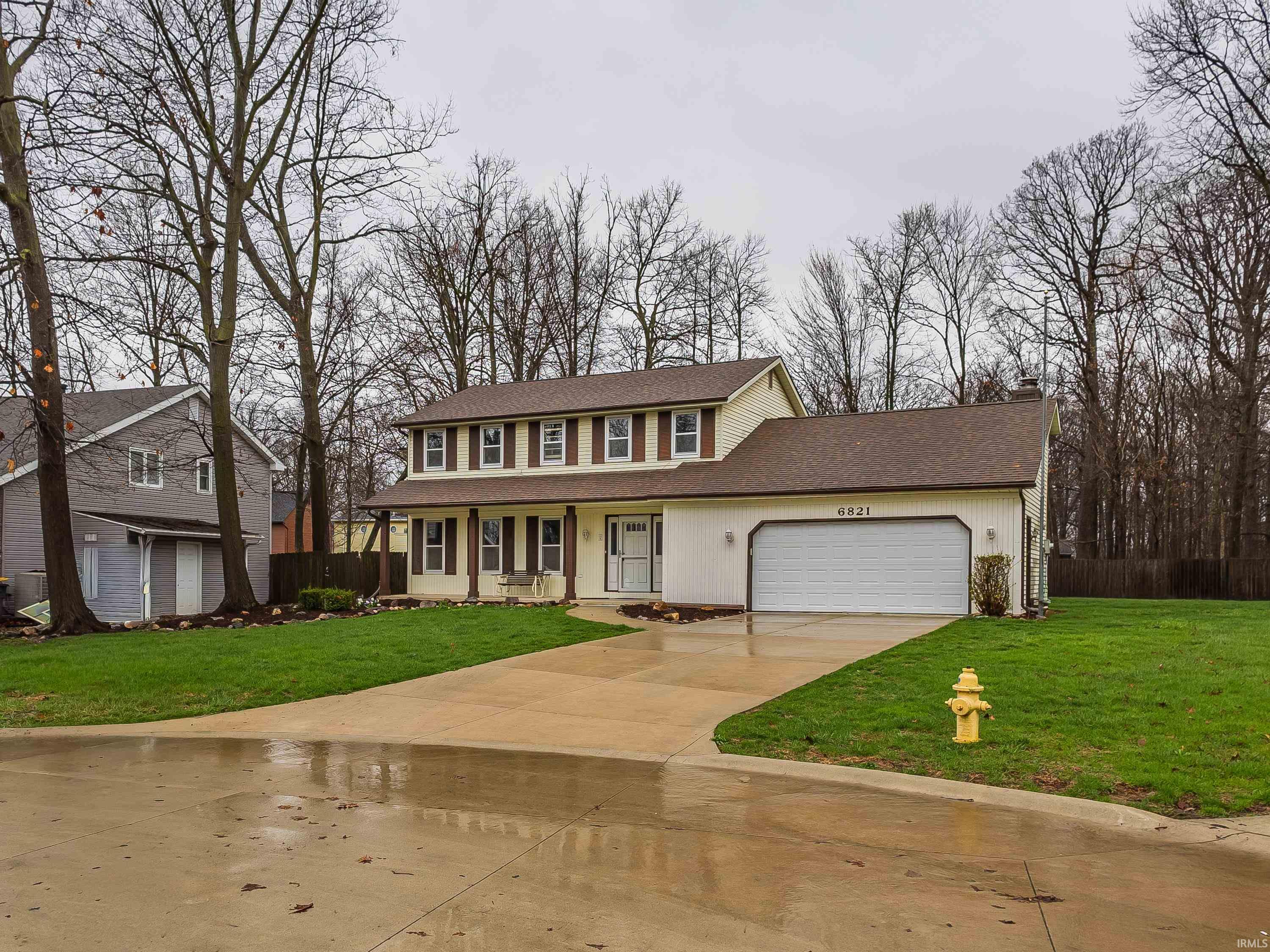 View of front of house with covered porch