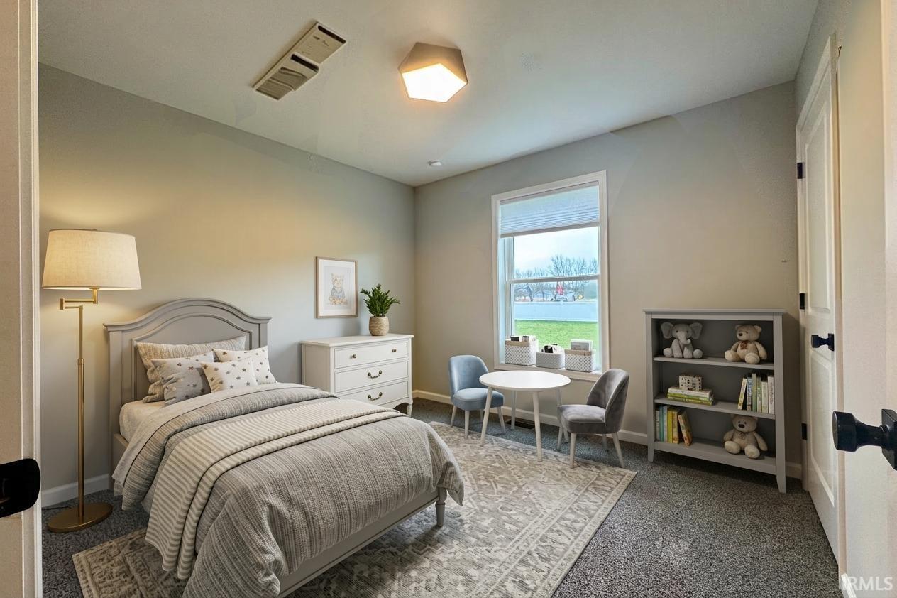 White single-hung window with blinds, carpeted flooring, built-in shelving unit, and a flush-mount ceiling light
